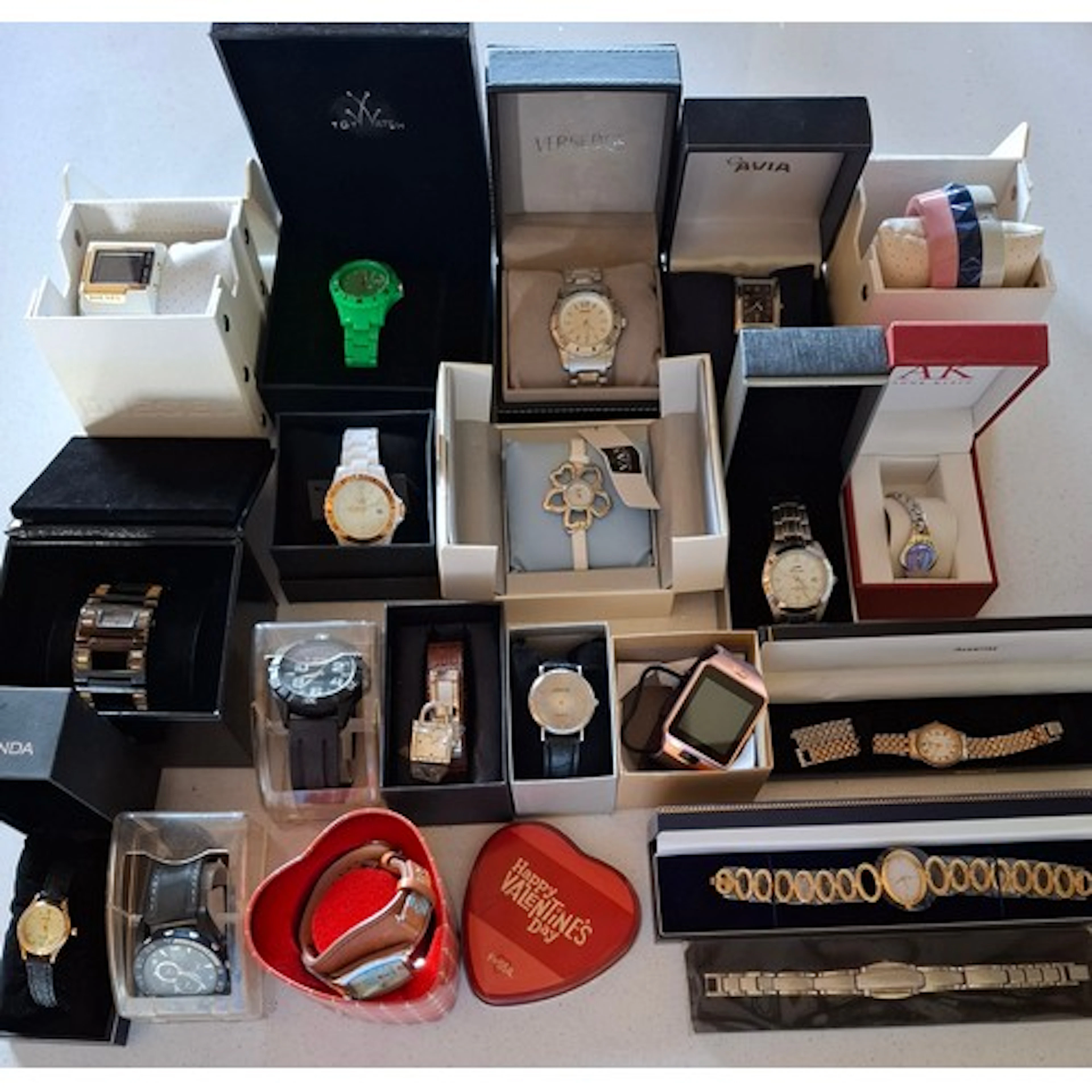 A quantity of boxed fashion watches to include Toy, Slazenge...
