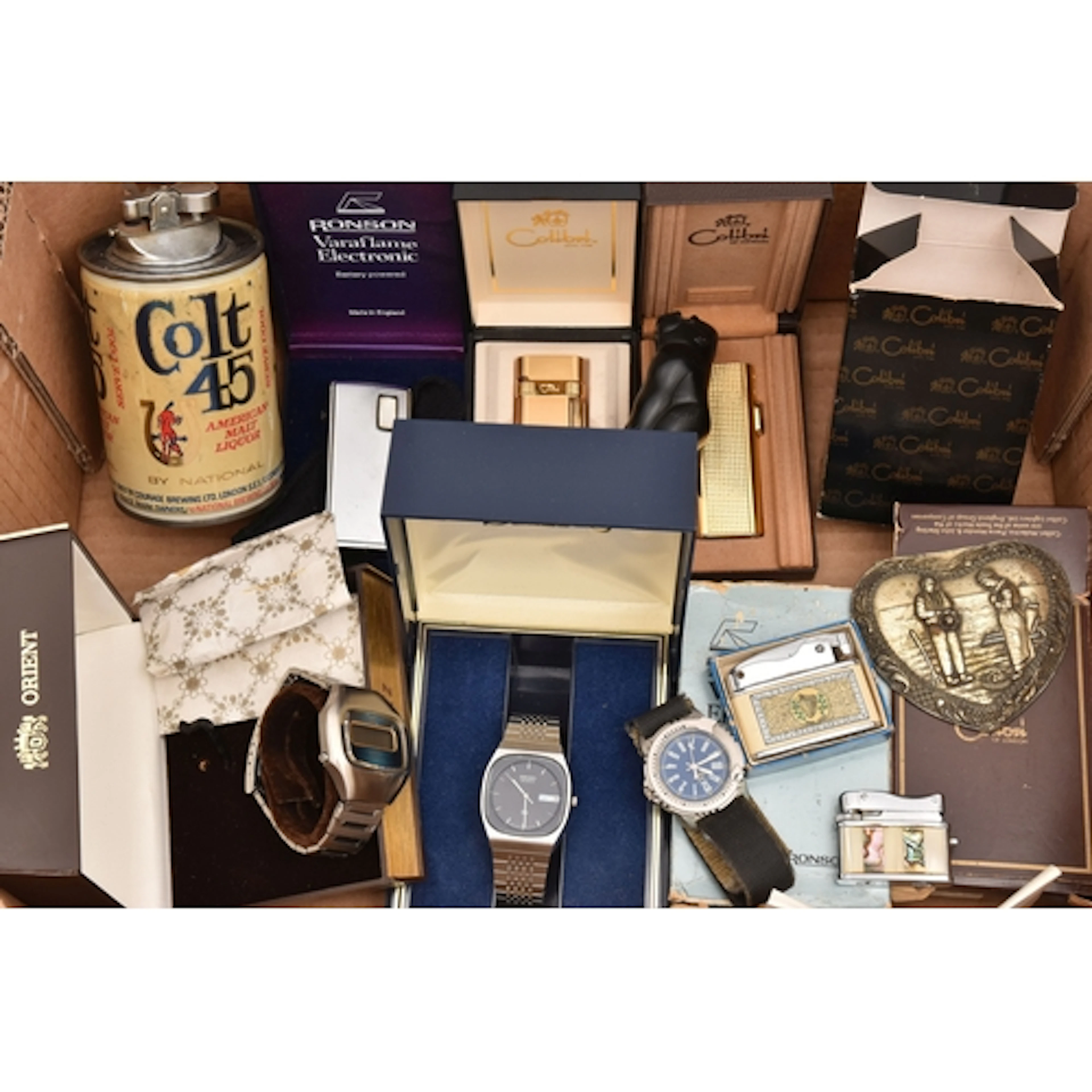 AN ASSORTMENT OF LIGHTERS AND WATCHES, to include a 'Masai' ...