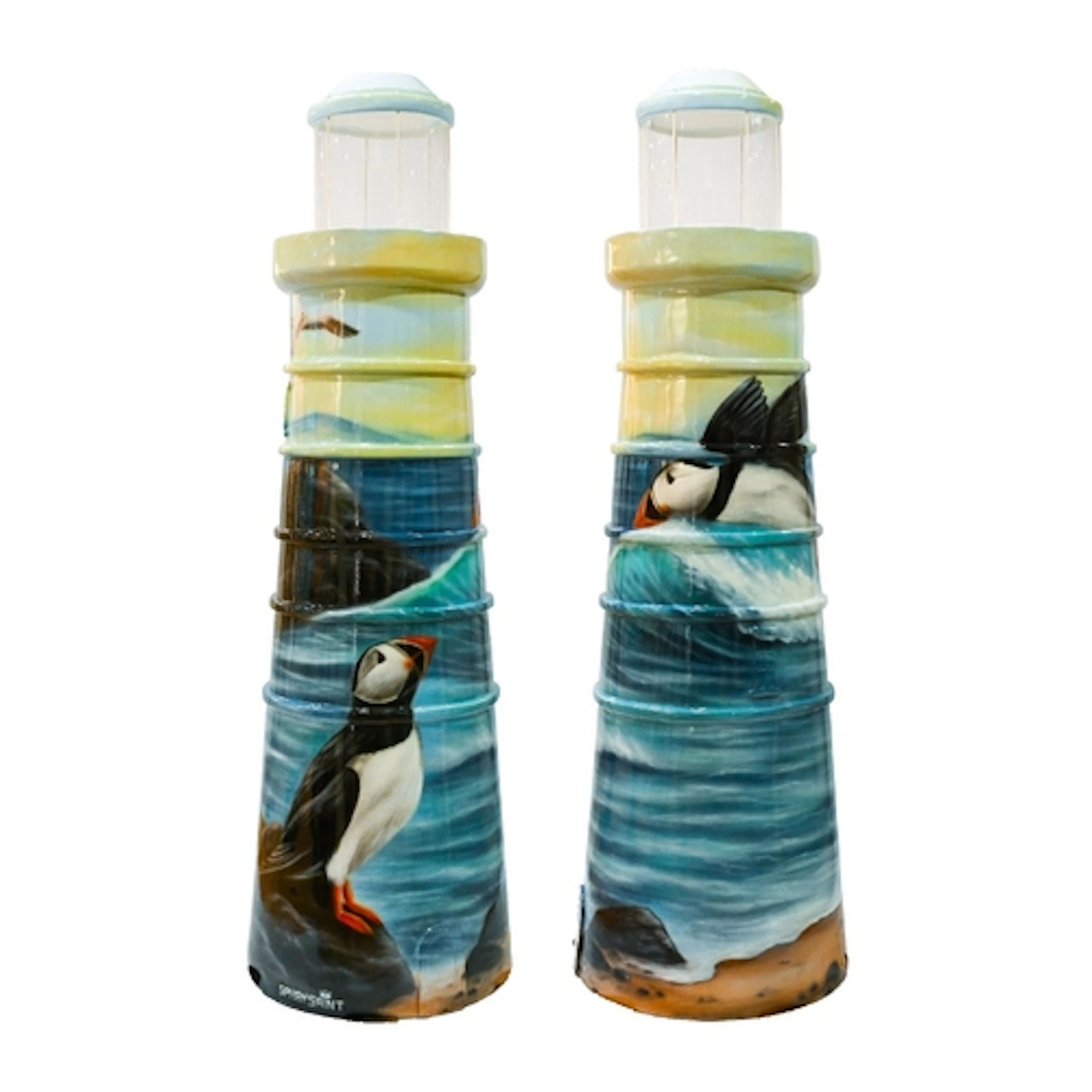 A large fibreglass sculpture "Playful Puffins" painted by Jo...