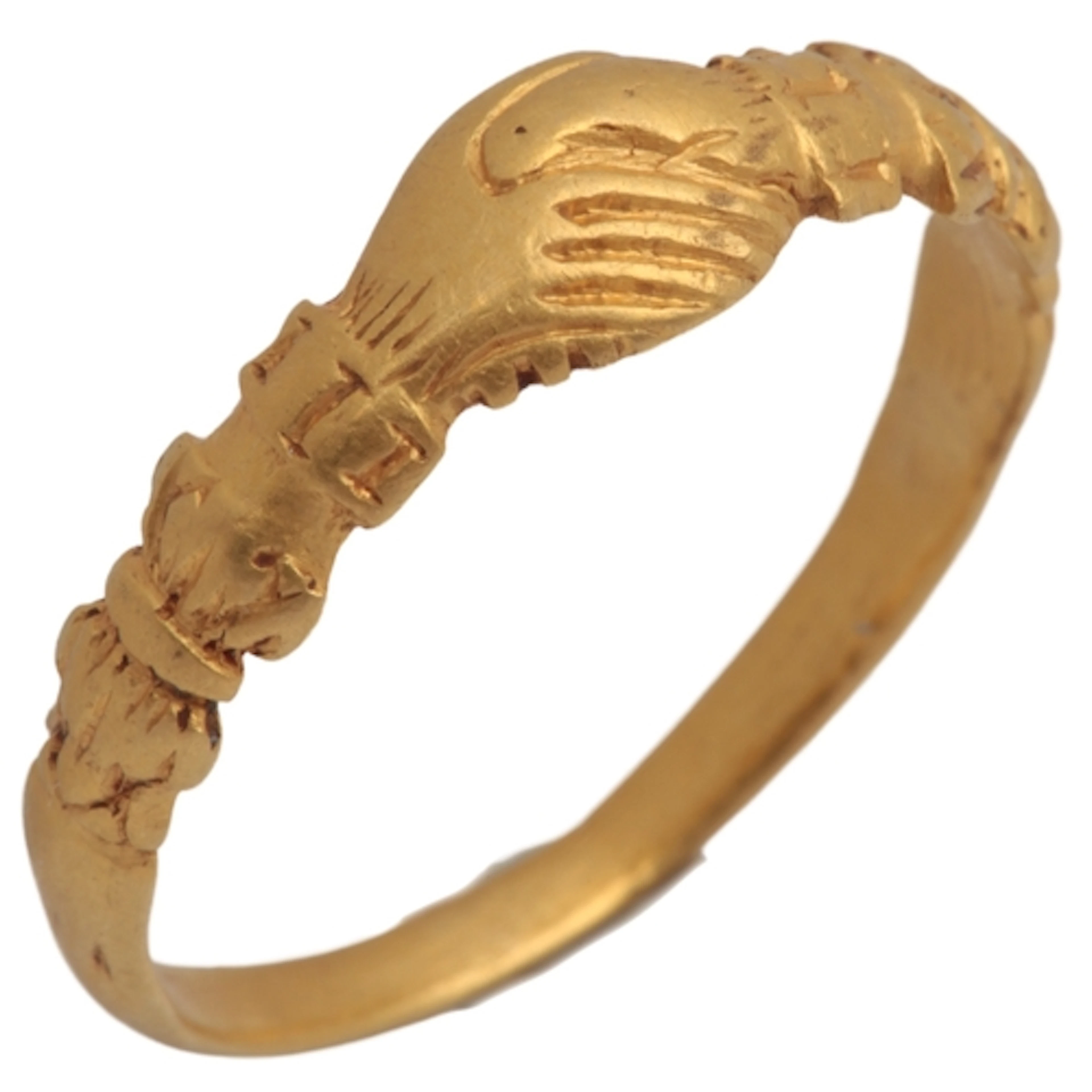 A gold 'fede' ring, 17th century, designed as a pair of hand...