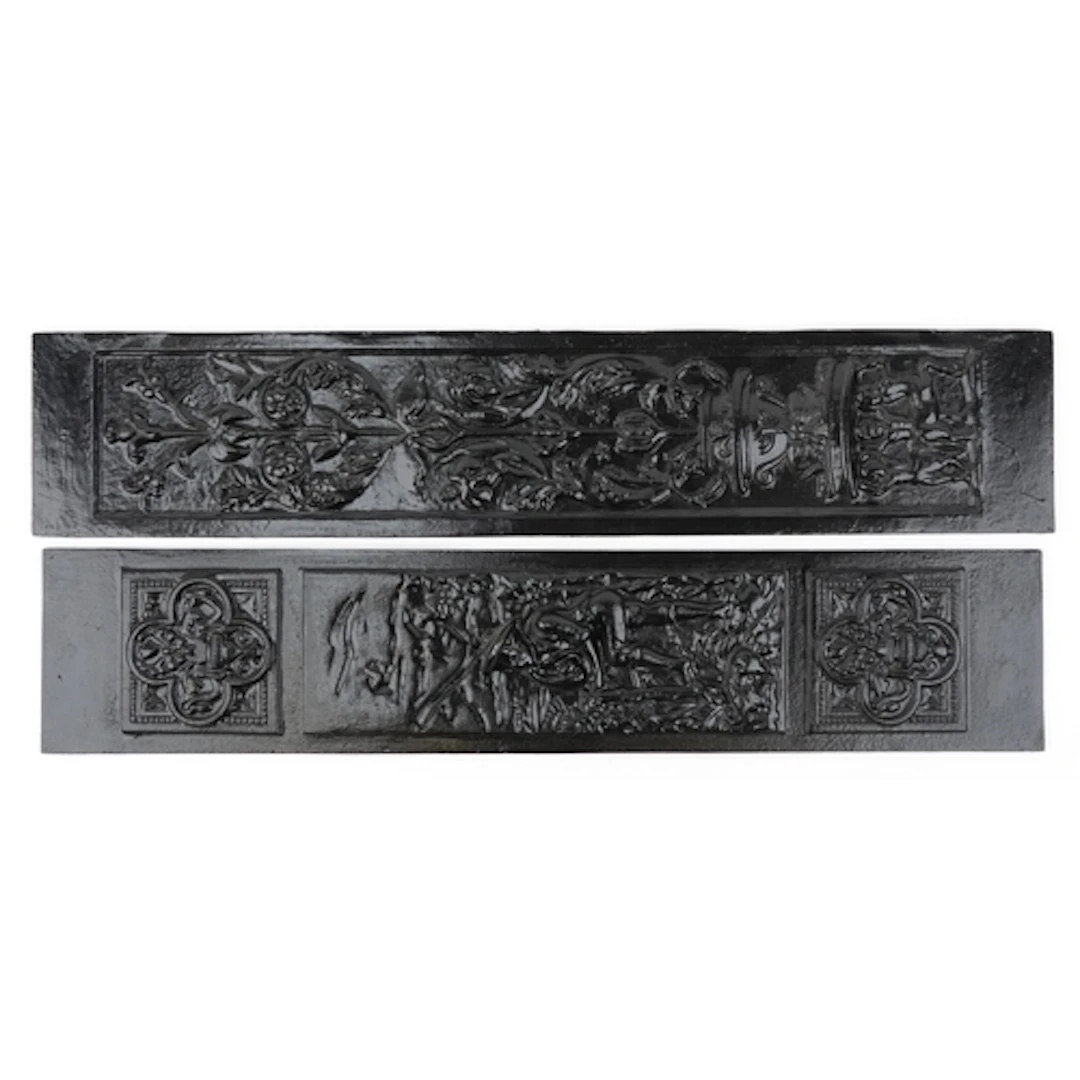 Two late 19th/20th century cast iron fireside panels, one de...
