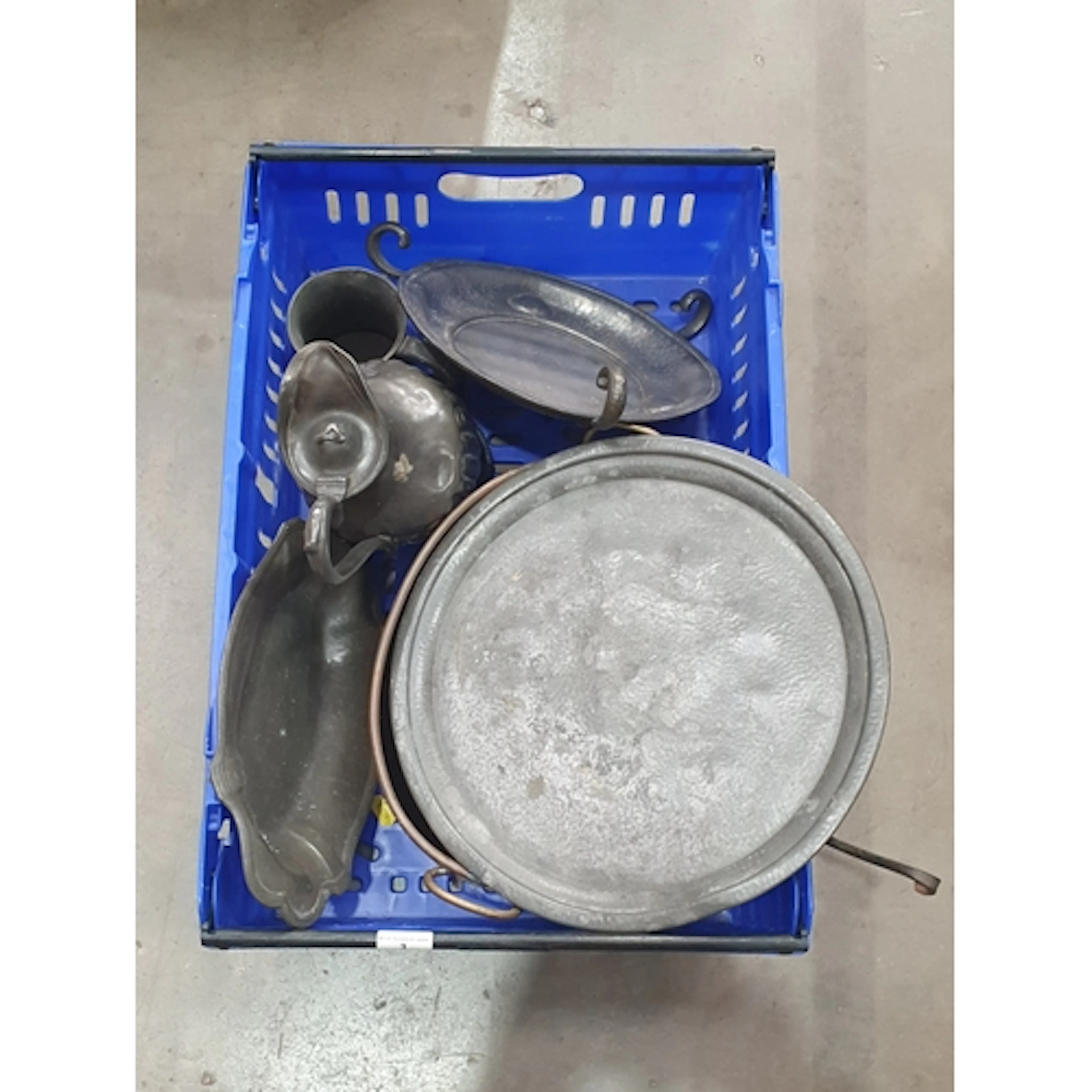 A crate of metalware to include Pewter plates, copper pots, ...