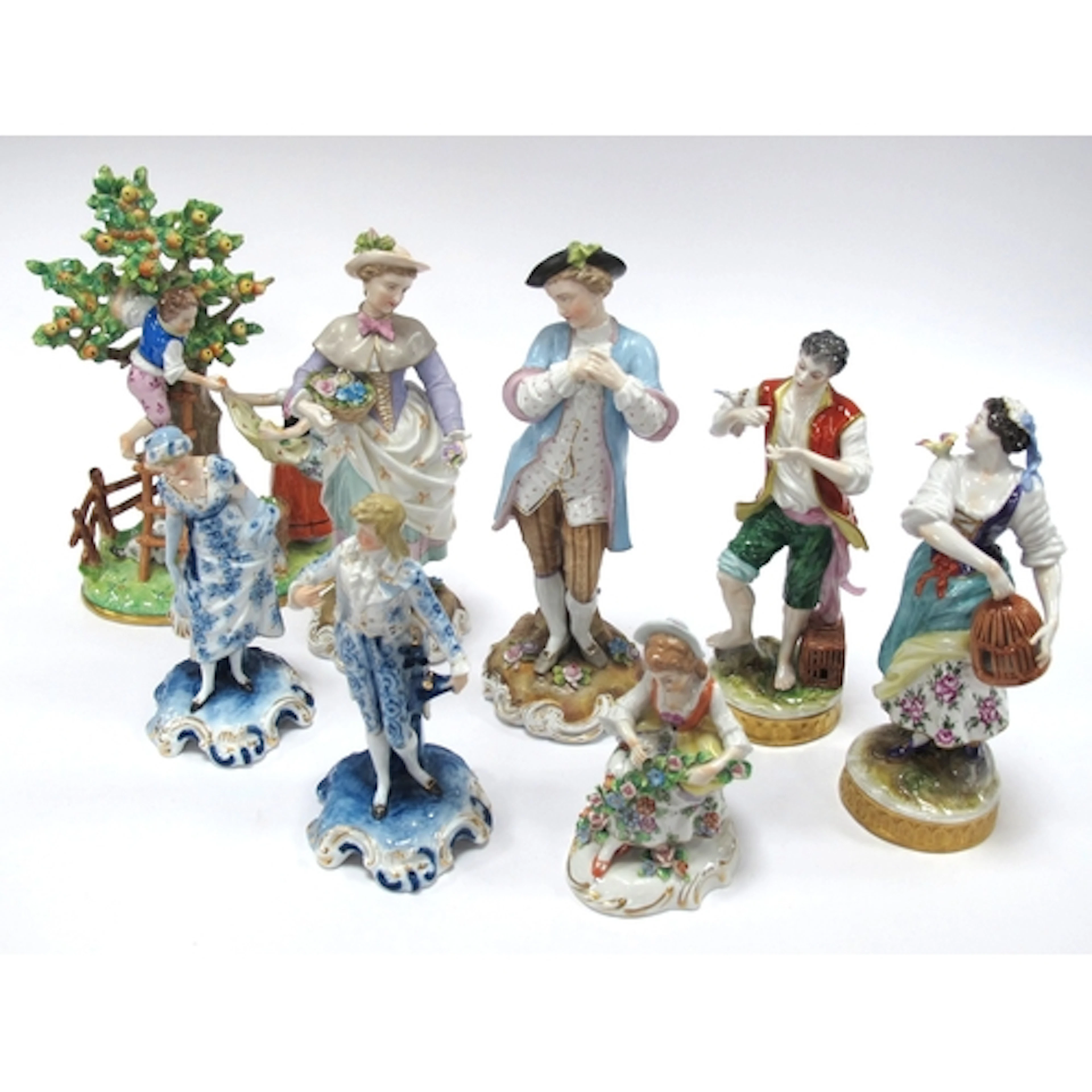 A Sitzendorf Porcelain Figure Group, modelled as a boy and g...