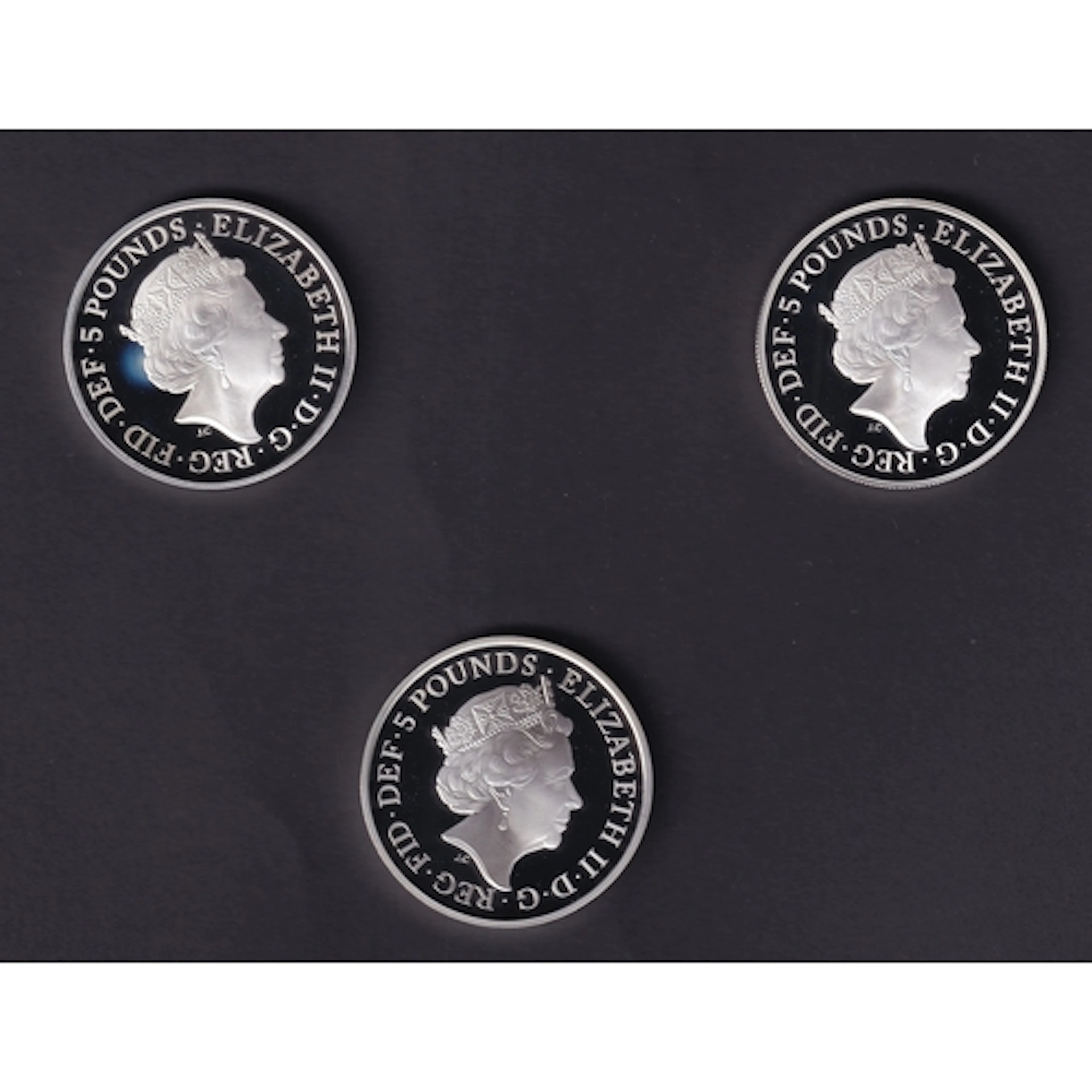2018 UK Queen Elizabeth II group of three silver proof £5 co...