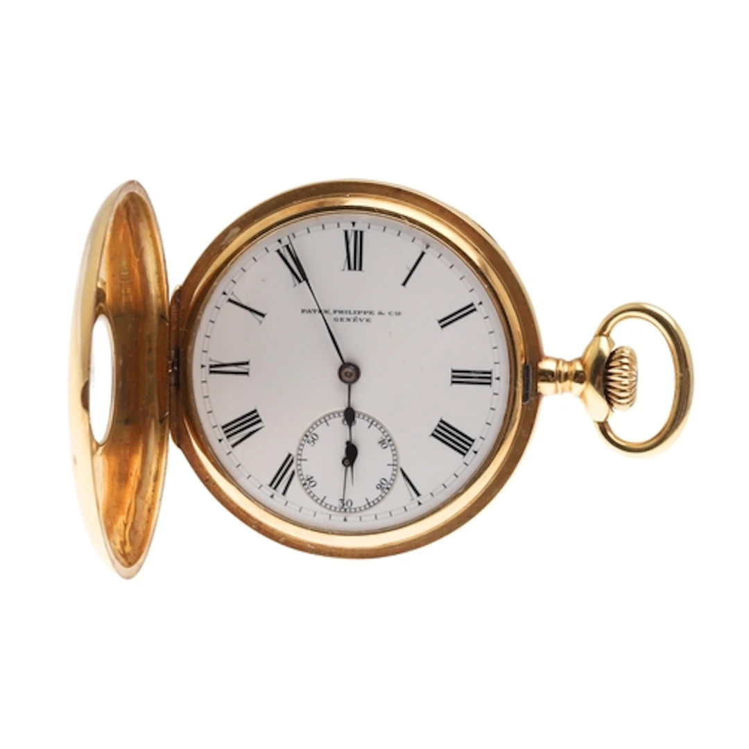 AN 18CT GOLD HALF HUNTING CASED POCKET WATCH BY PATEK PHILIP...