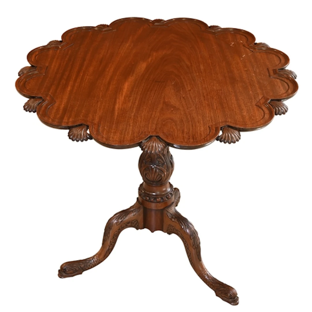 A mahogany tripod table, 20th c, the scalloped top with scal...