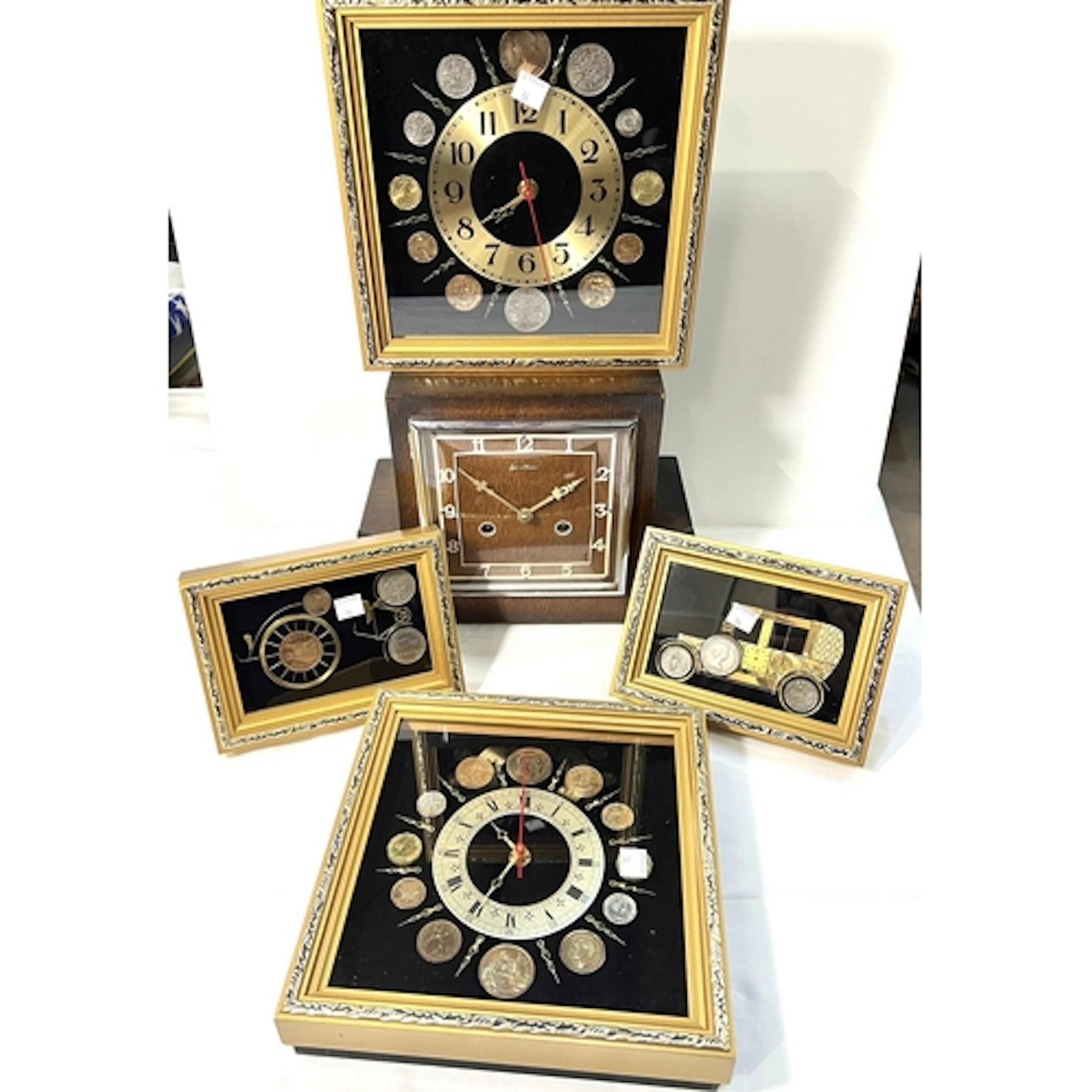 An Art Nouveau oak striking mantle clock, 4 novelty wall clo...