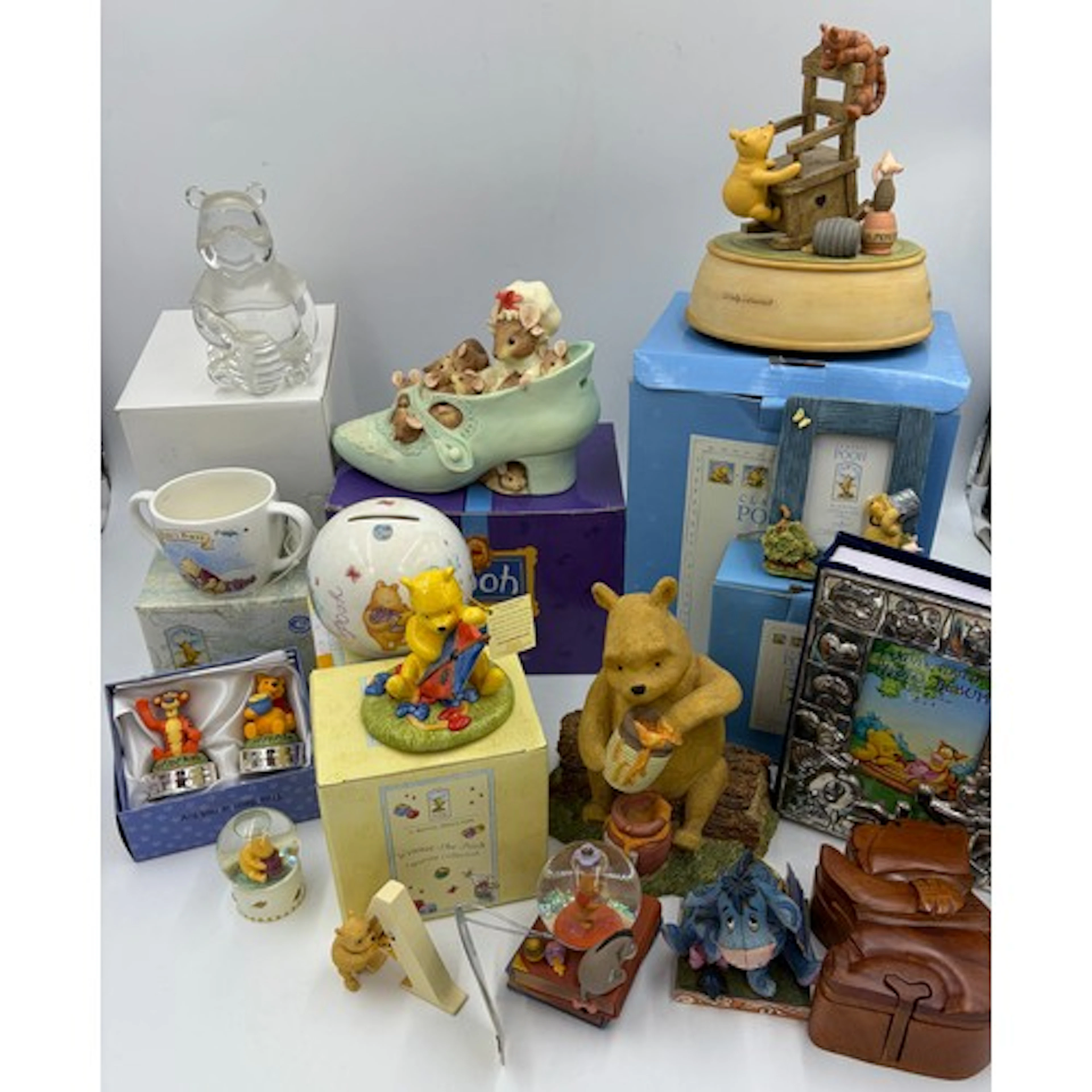 Winnie the Pooh collectables including wooden puzzle box, si...