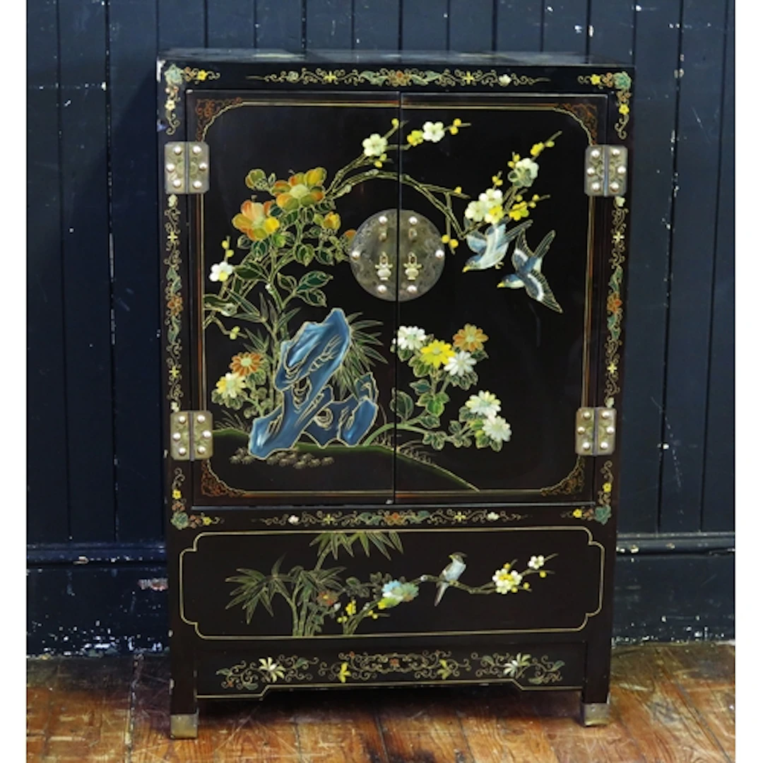 A 20th century lacquered and painted side cabinet in the Chi...