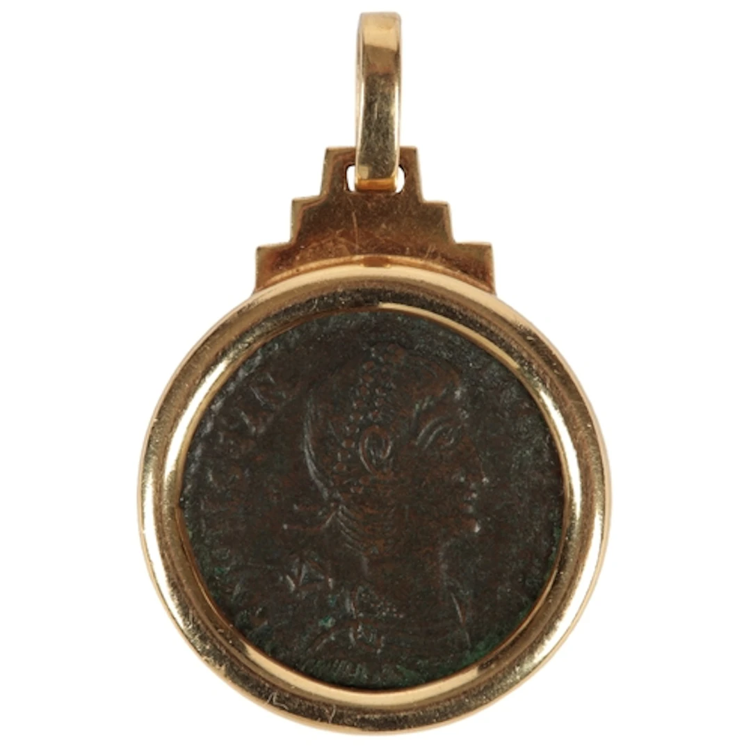 A gold and Roman bronze coin pendant, collet-set with an anc...