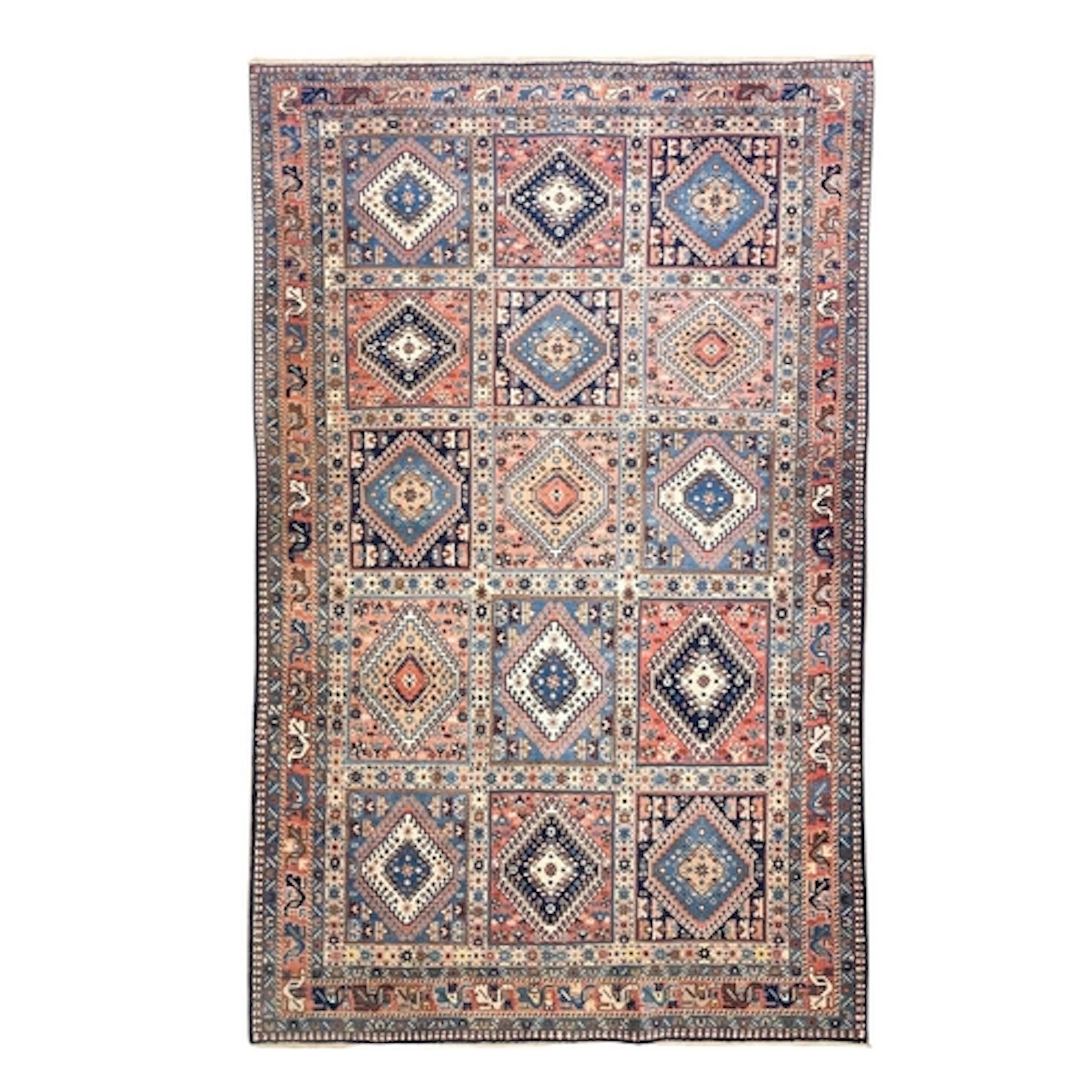 A Persian Yalameh carpet. With repeated panel design of hook...