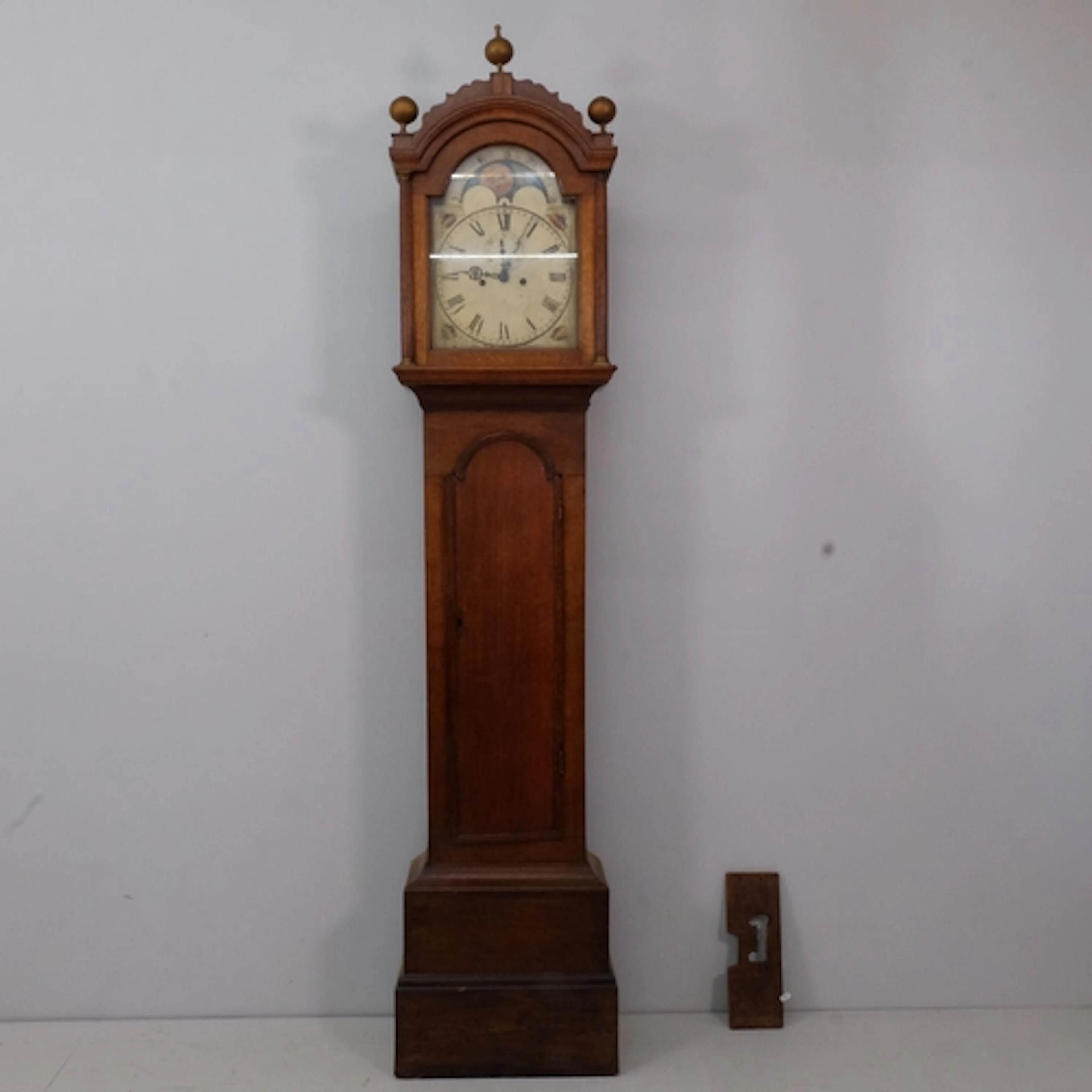 An 18th century 8 day grandfather clock, moon phase striking...