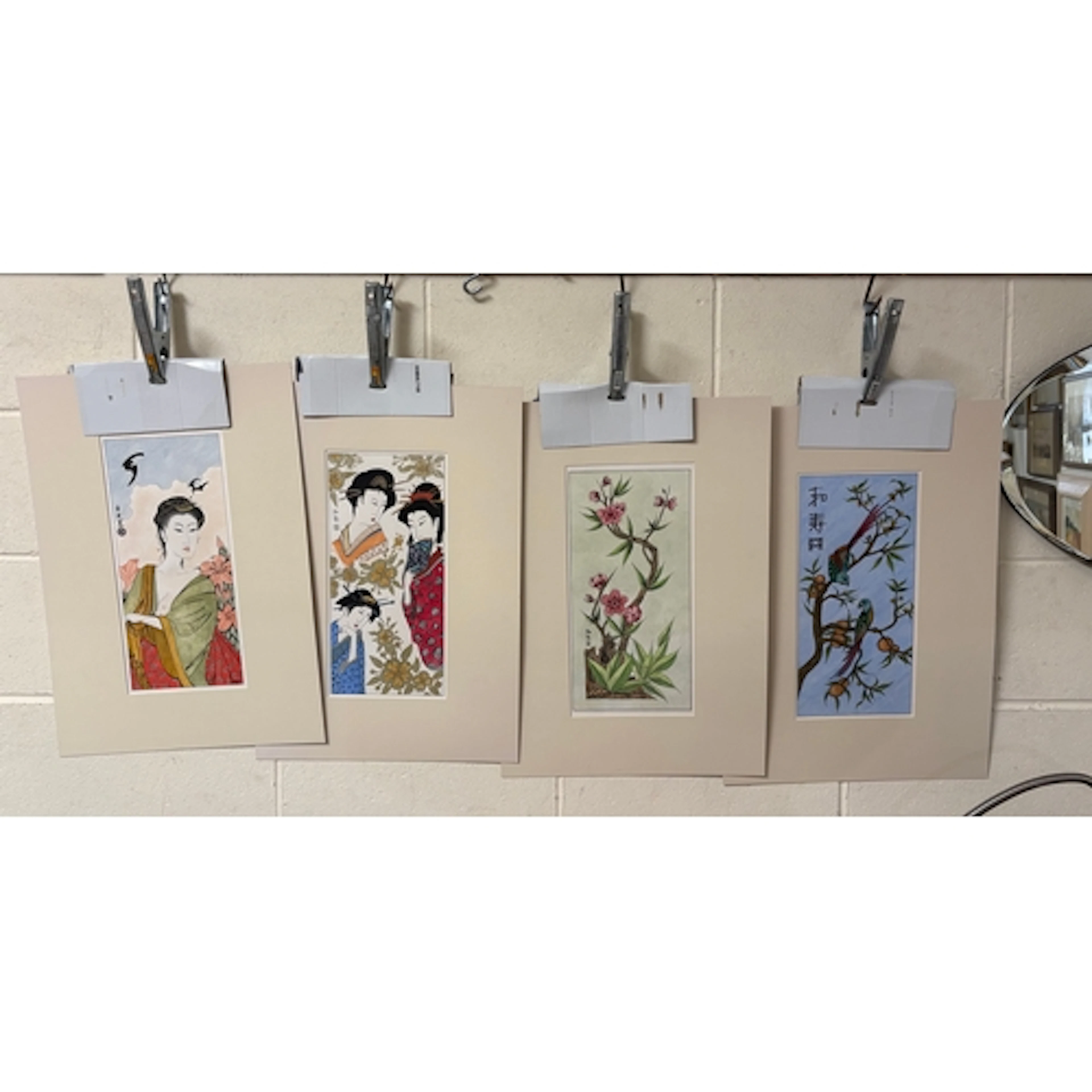 Four modern Oriental un-framed pictures and an oval mirror (...