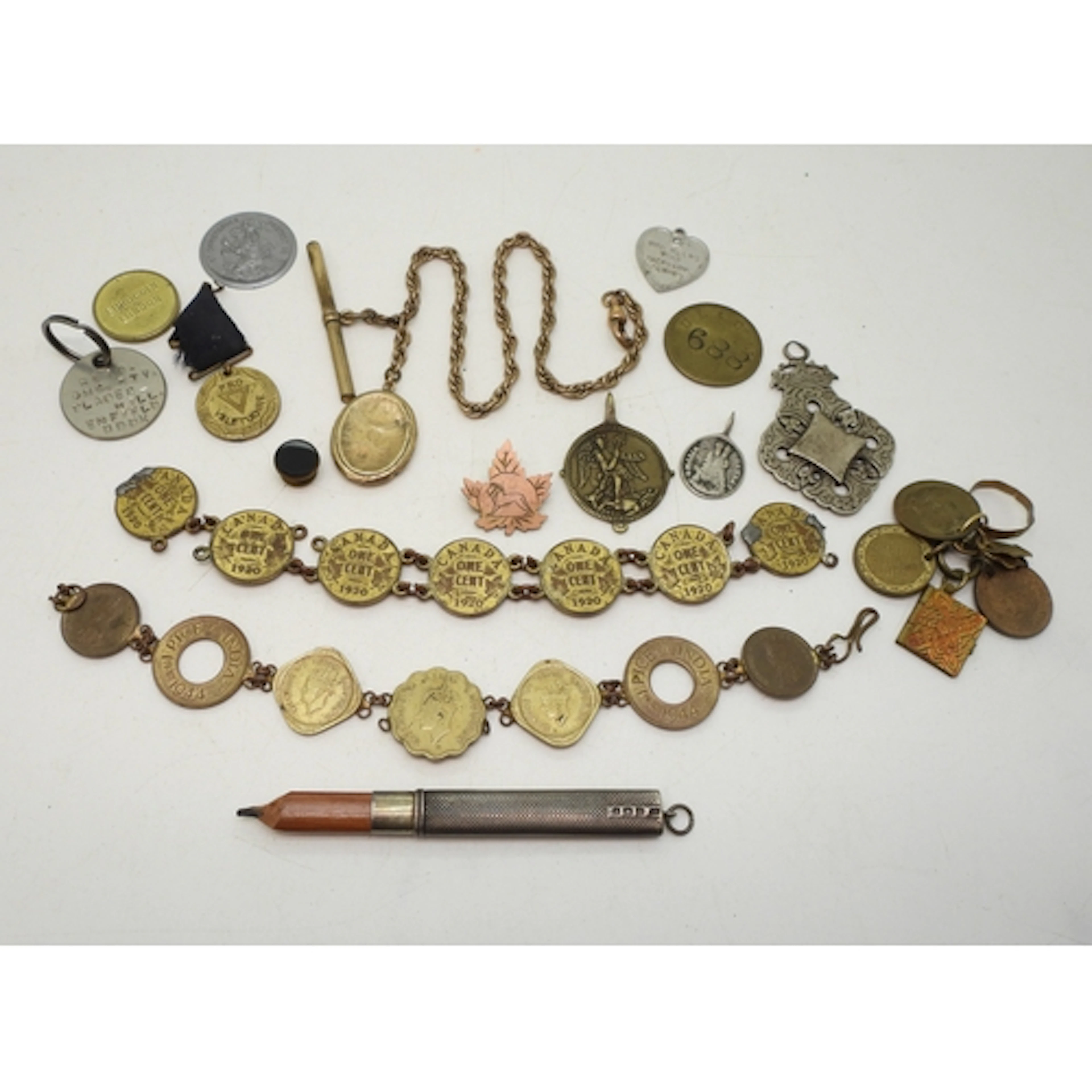 A silver cased pencil, a large white metal medallion, two de...