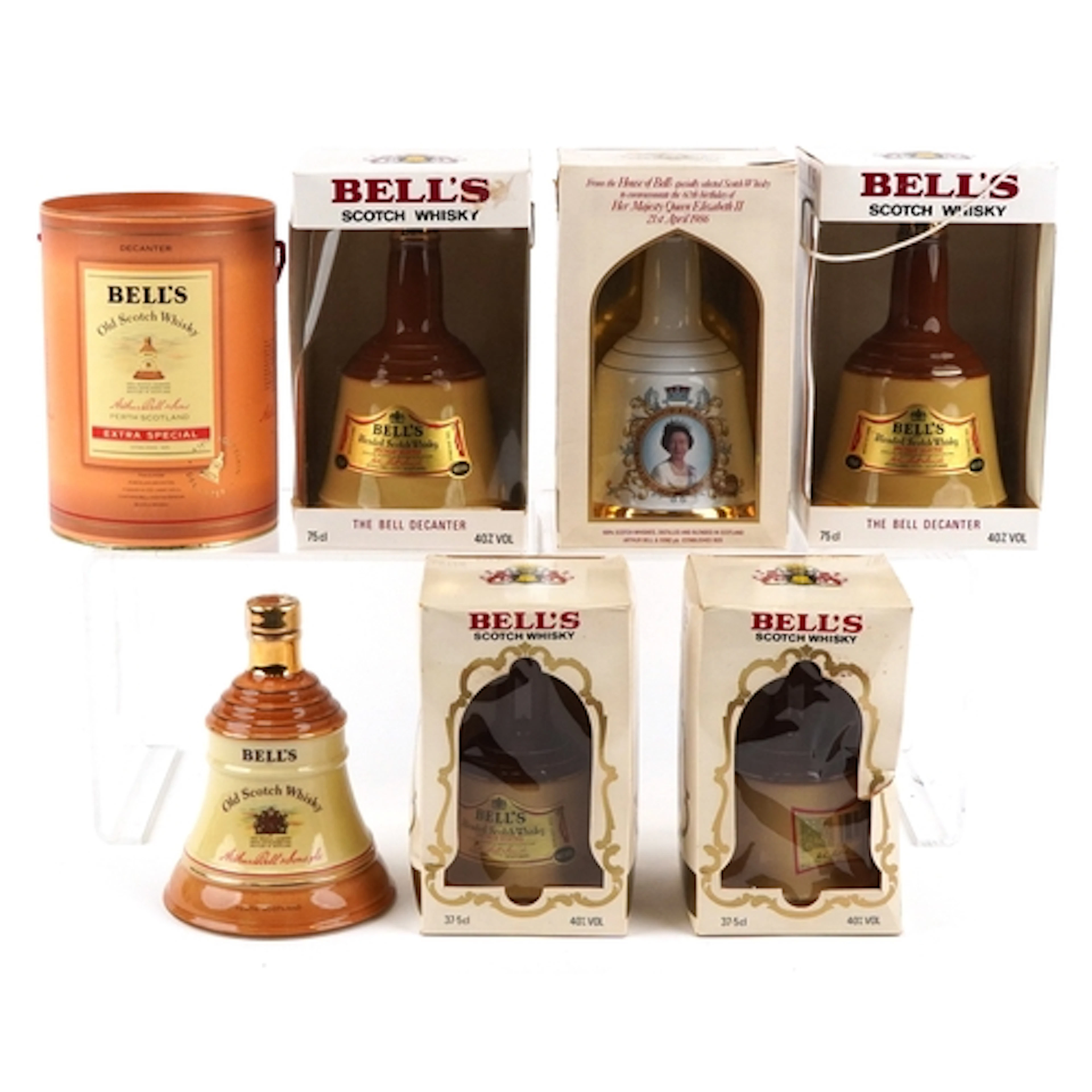 Six Bell's whisky decanters, various sizes, including The Ce...