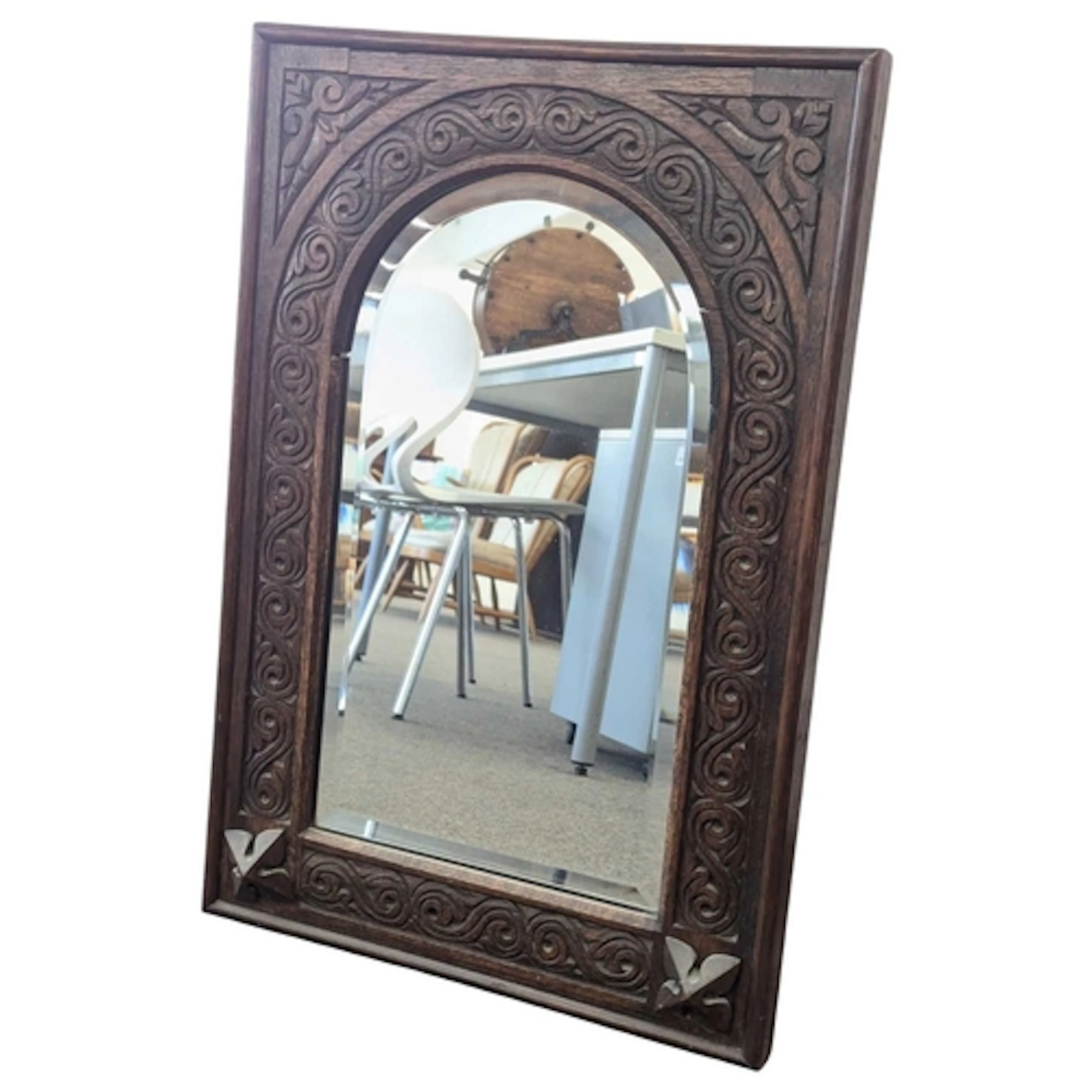 A vintage mid century carved oak Gothic Revival wall mirror....