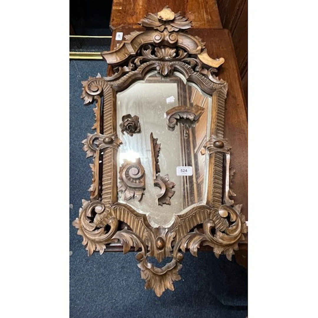 Mahogany framed shield shaped wall mirror (af), 78cm x 45cm.
