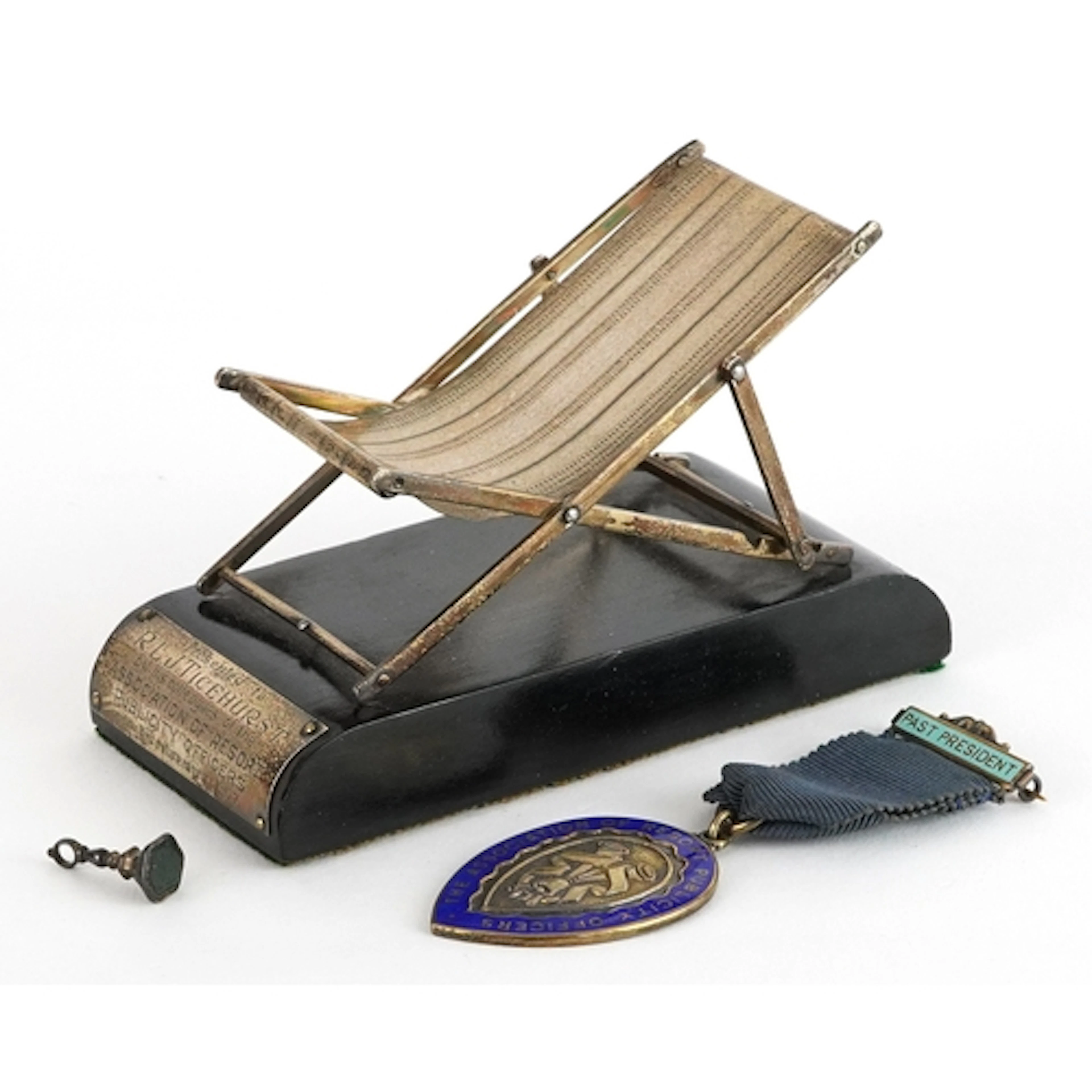 Silver plated model of a deckchair with presentation inscrip...