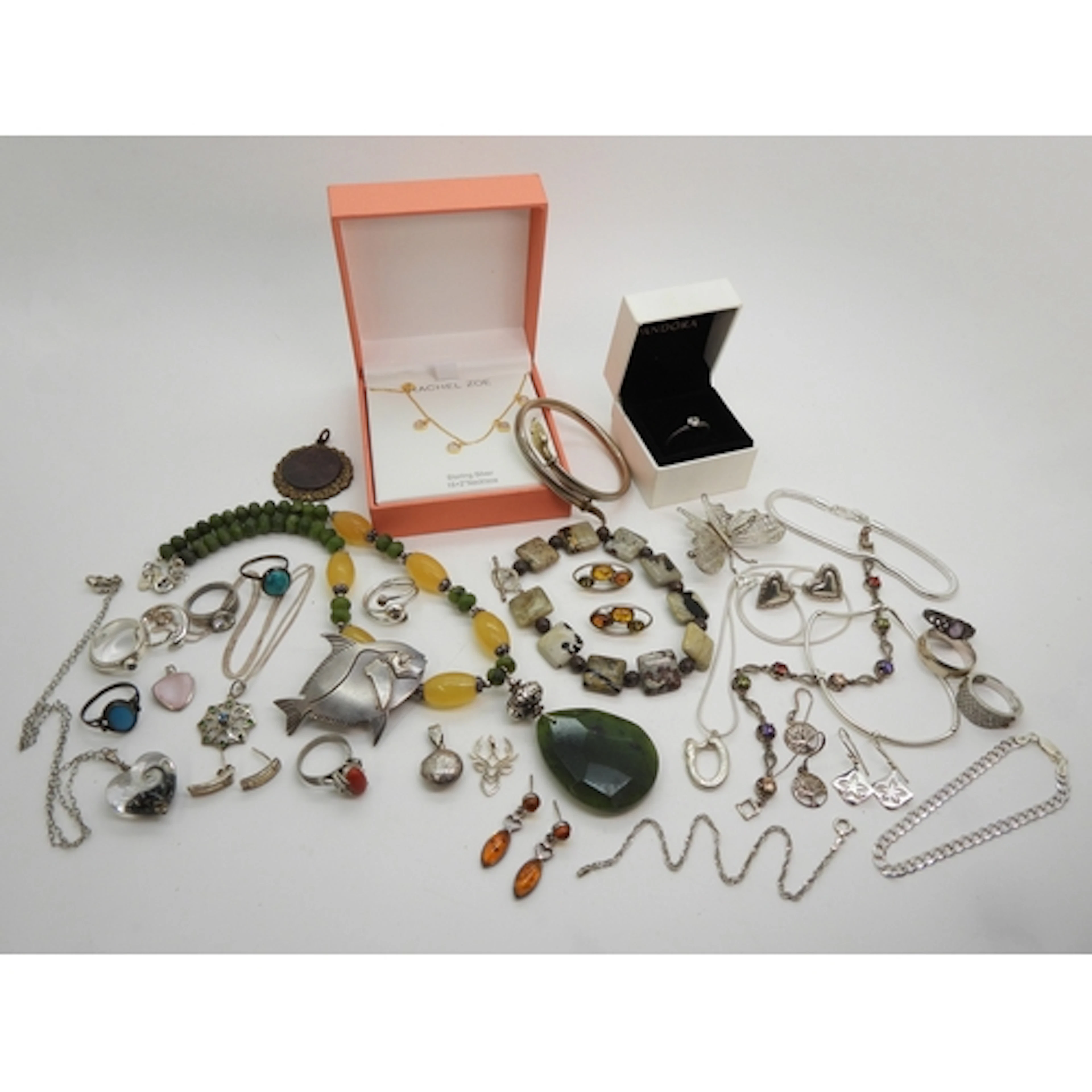 A collection of silver and costume jewellery to include a si...