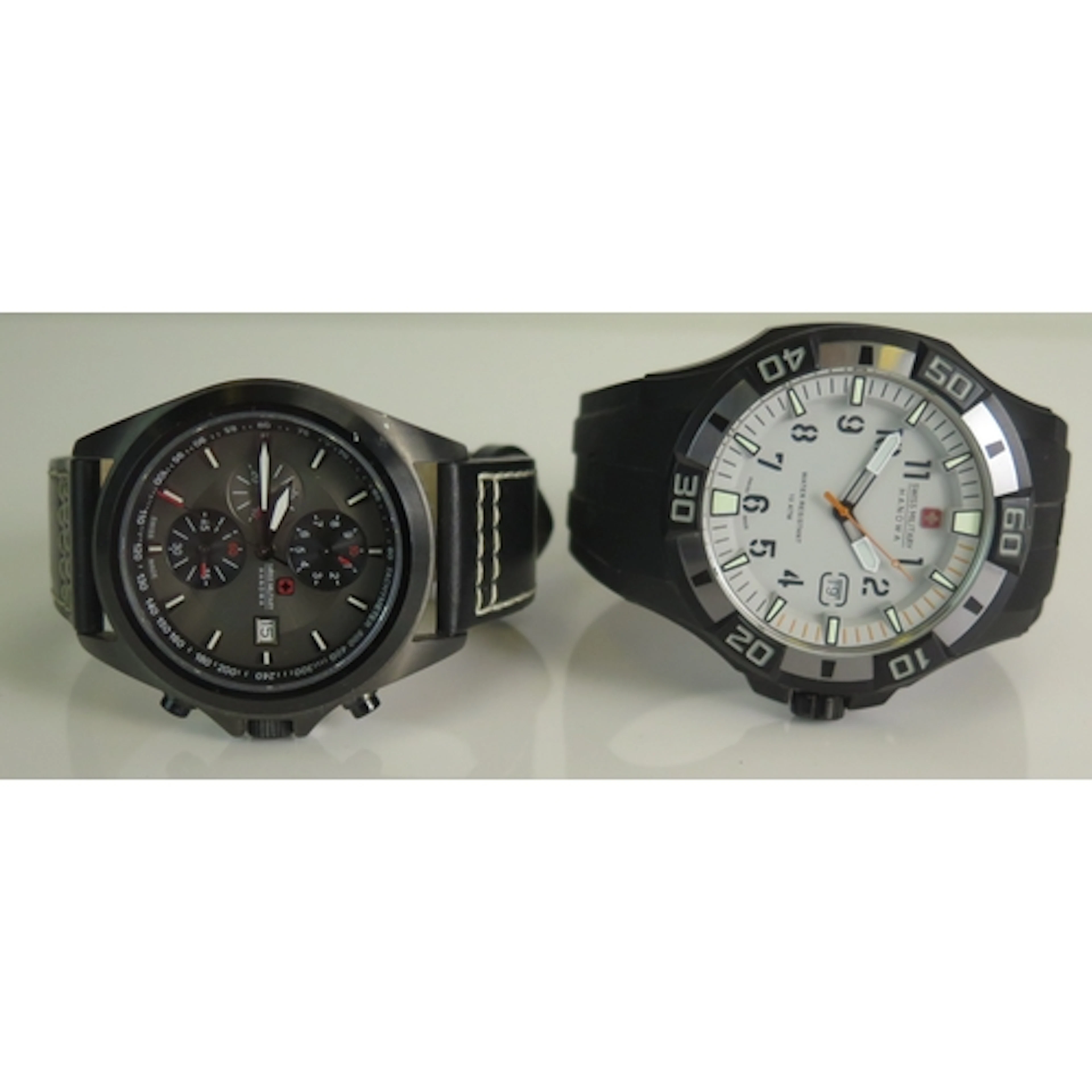 Two Swiss Military Hanowa quartz wristwatches. Boxed. One ru...