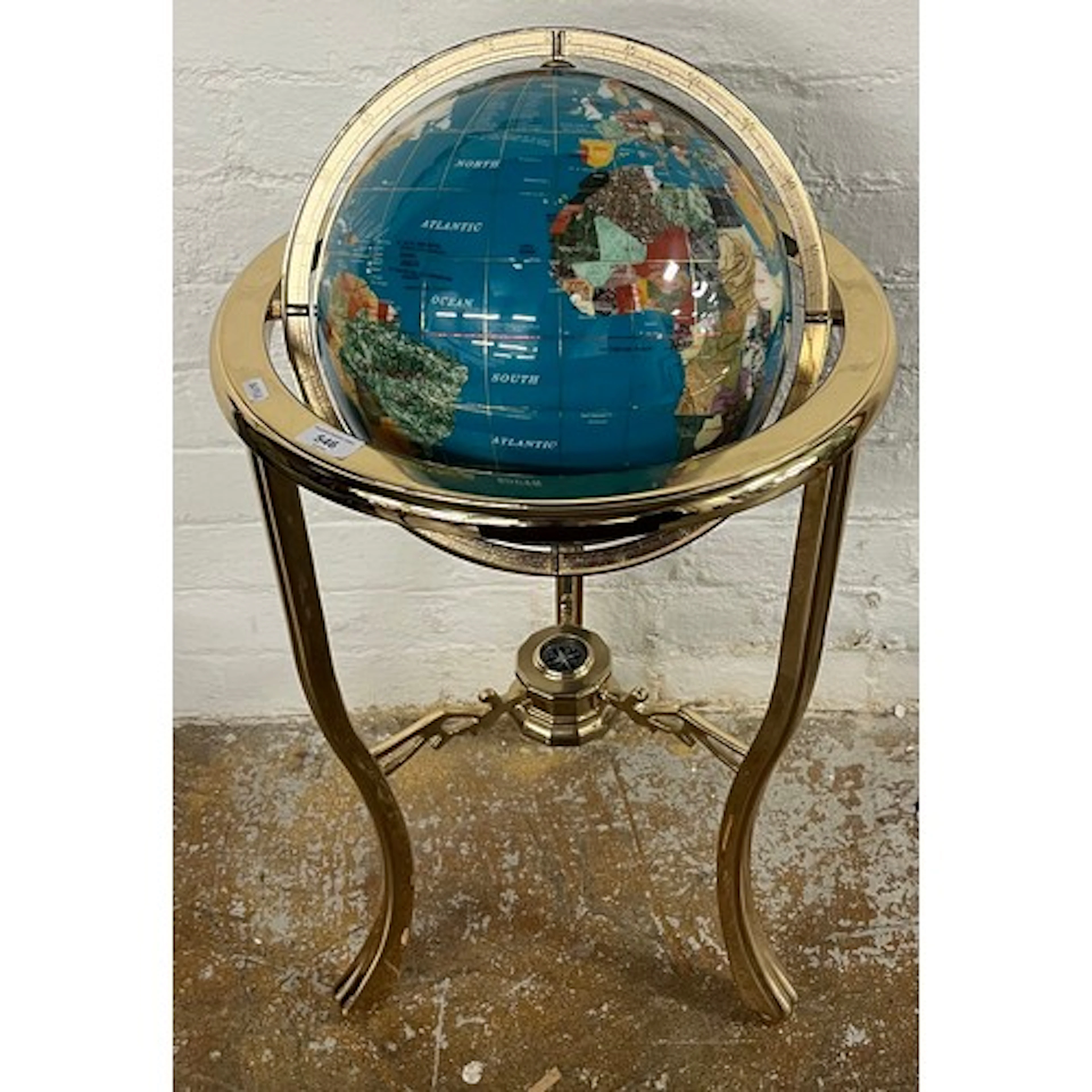 Floor standing gemstone world globe with inset compass to st...