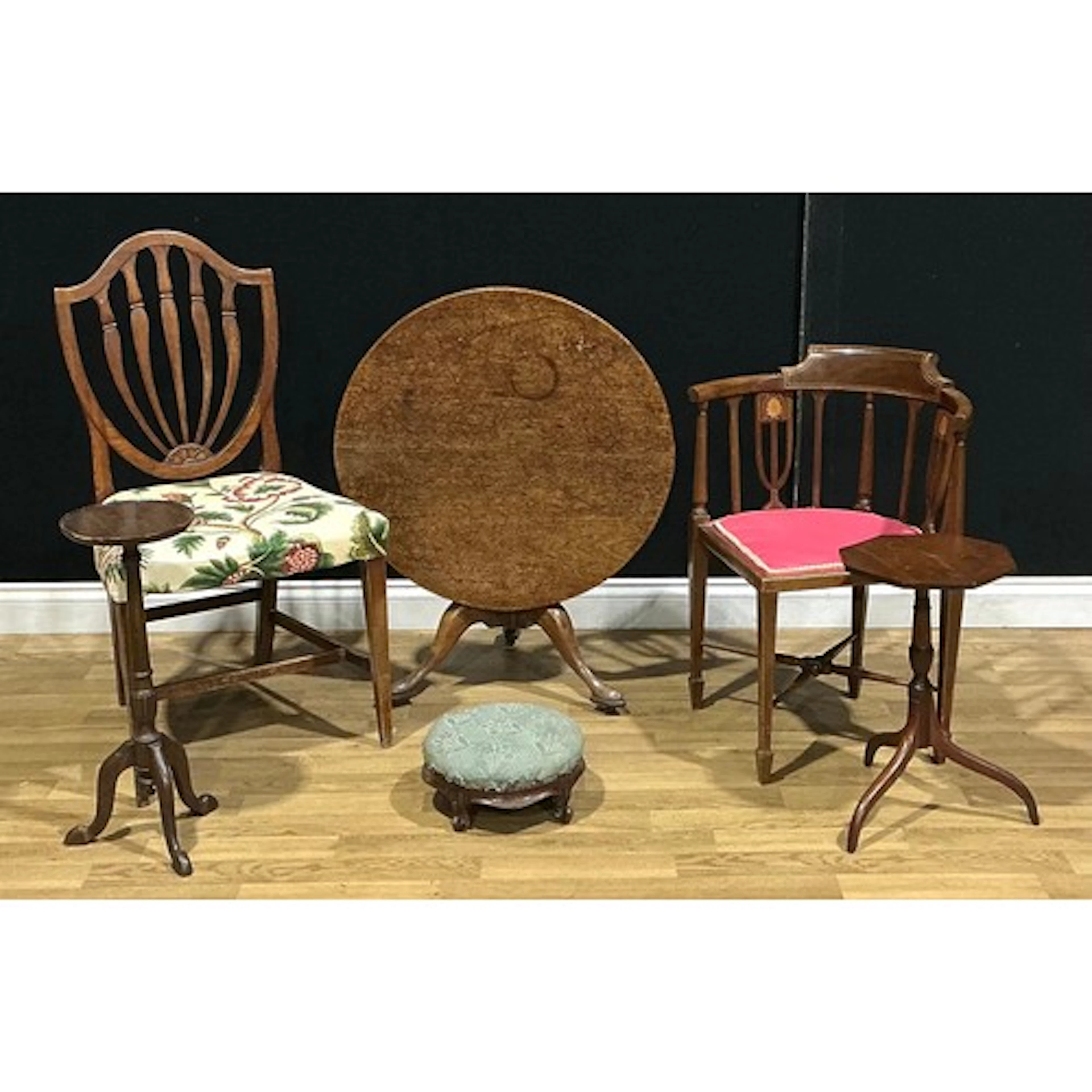 A 19th century mahogany low tripod occasional table, reduced...