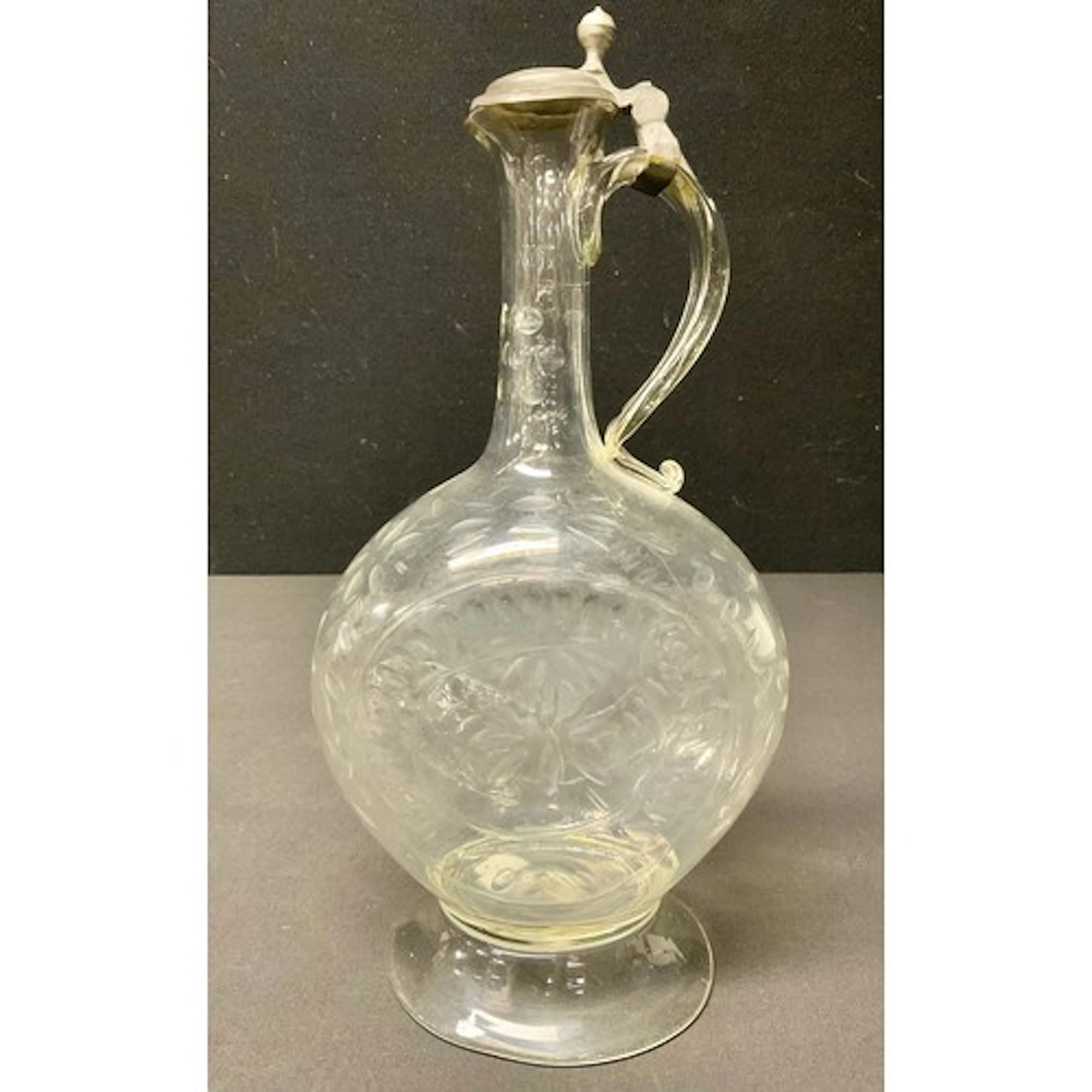 A pewter mounted glass claret jug, late 18th/early 19th cent...