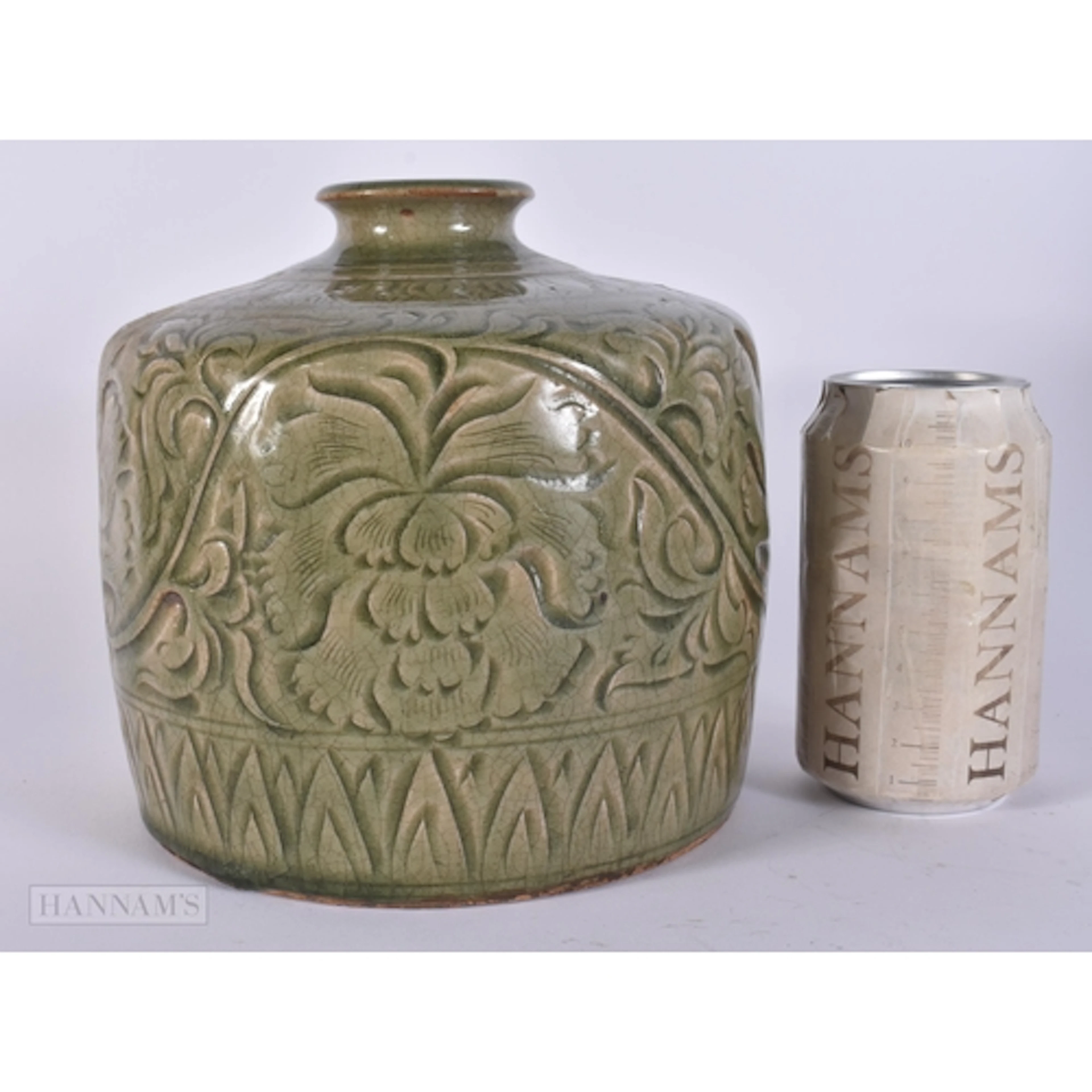A CHINESE CELADON YAO ZHOU SQUAT VASE. 18 cm x 15 cm.