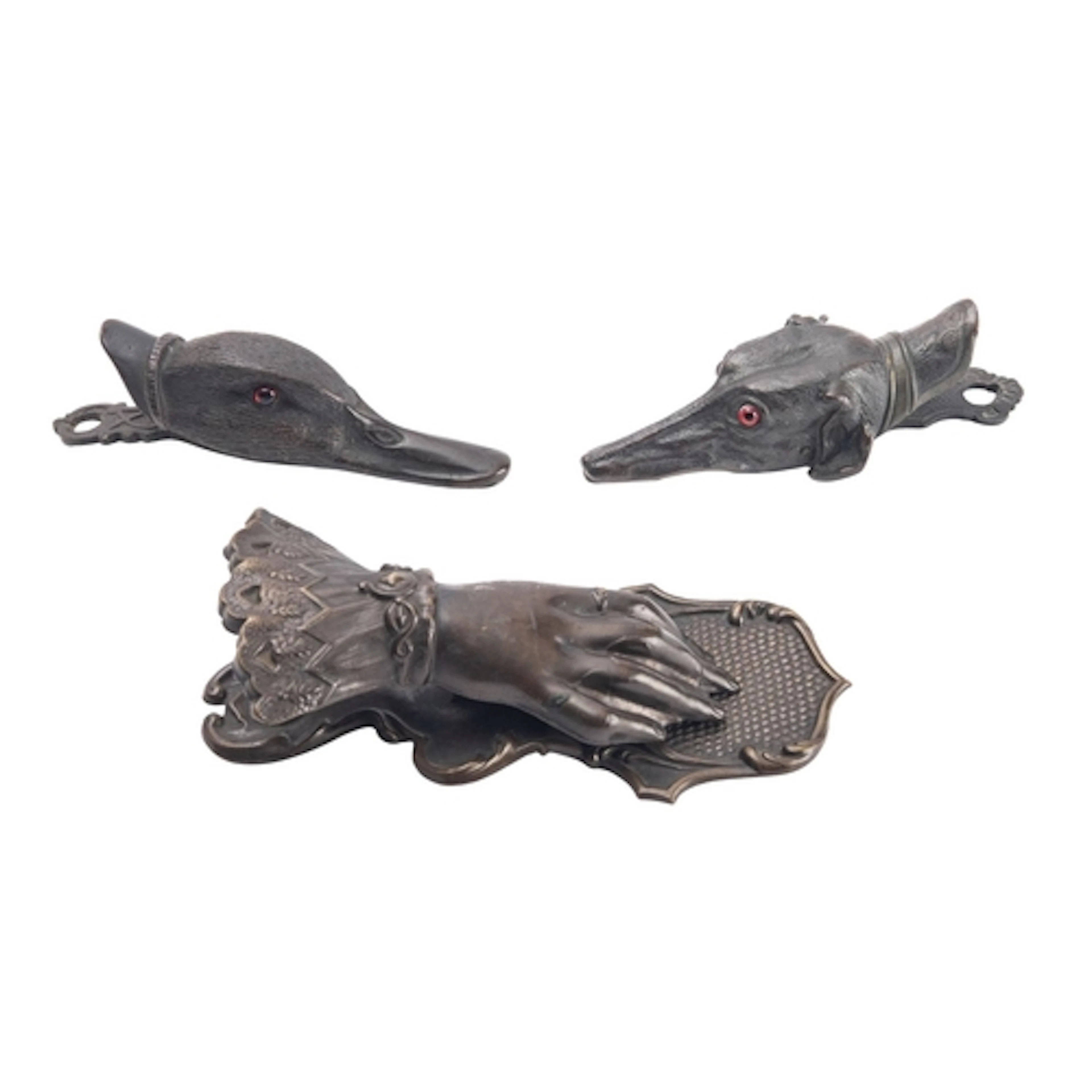Two Austrian bronze letter clips in the form of a duck's hea...