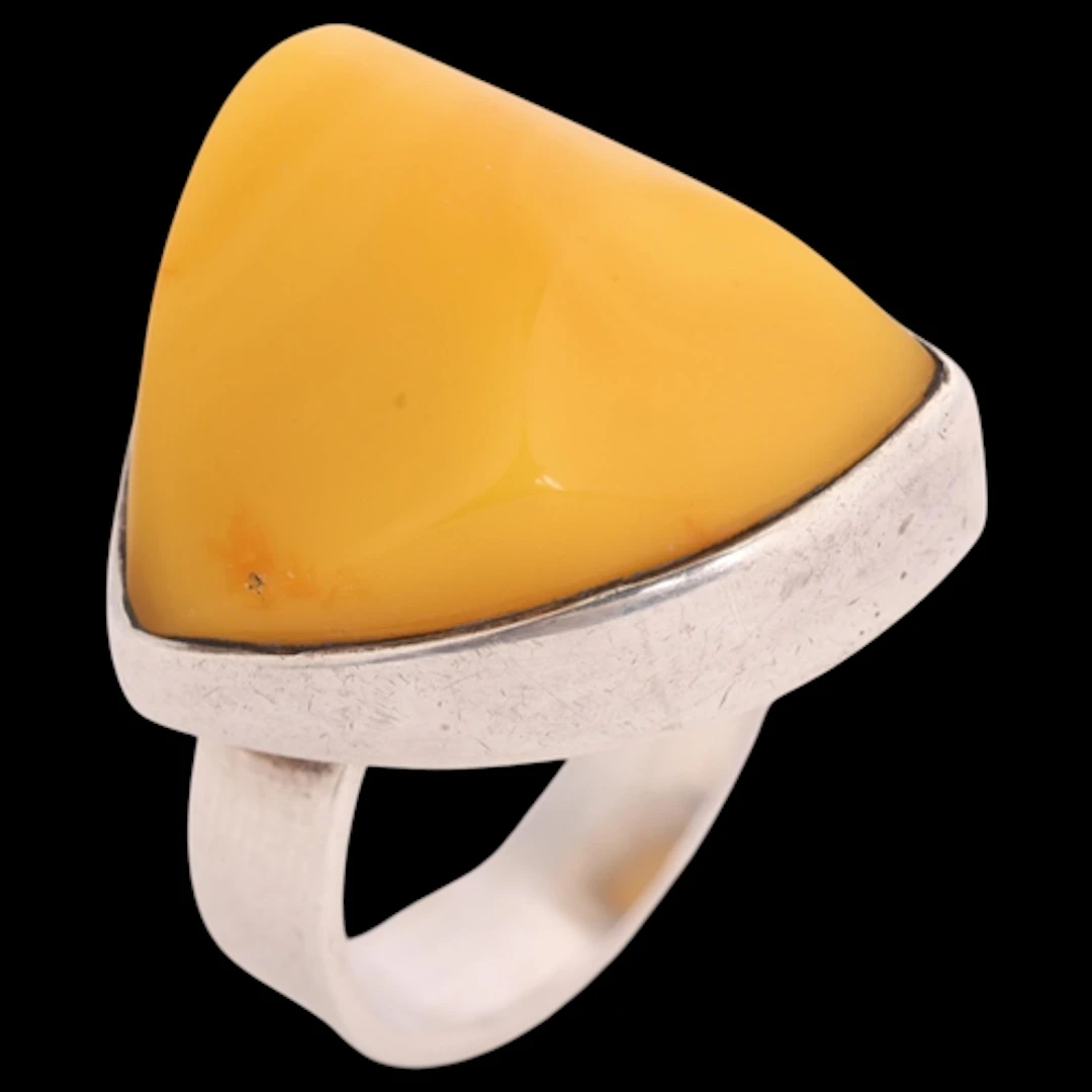 EINER FEHRN - a Danish modernist sterling silver amber ring,...
