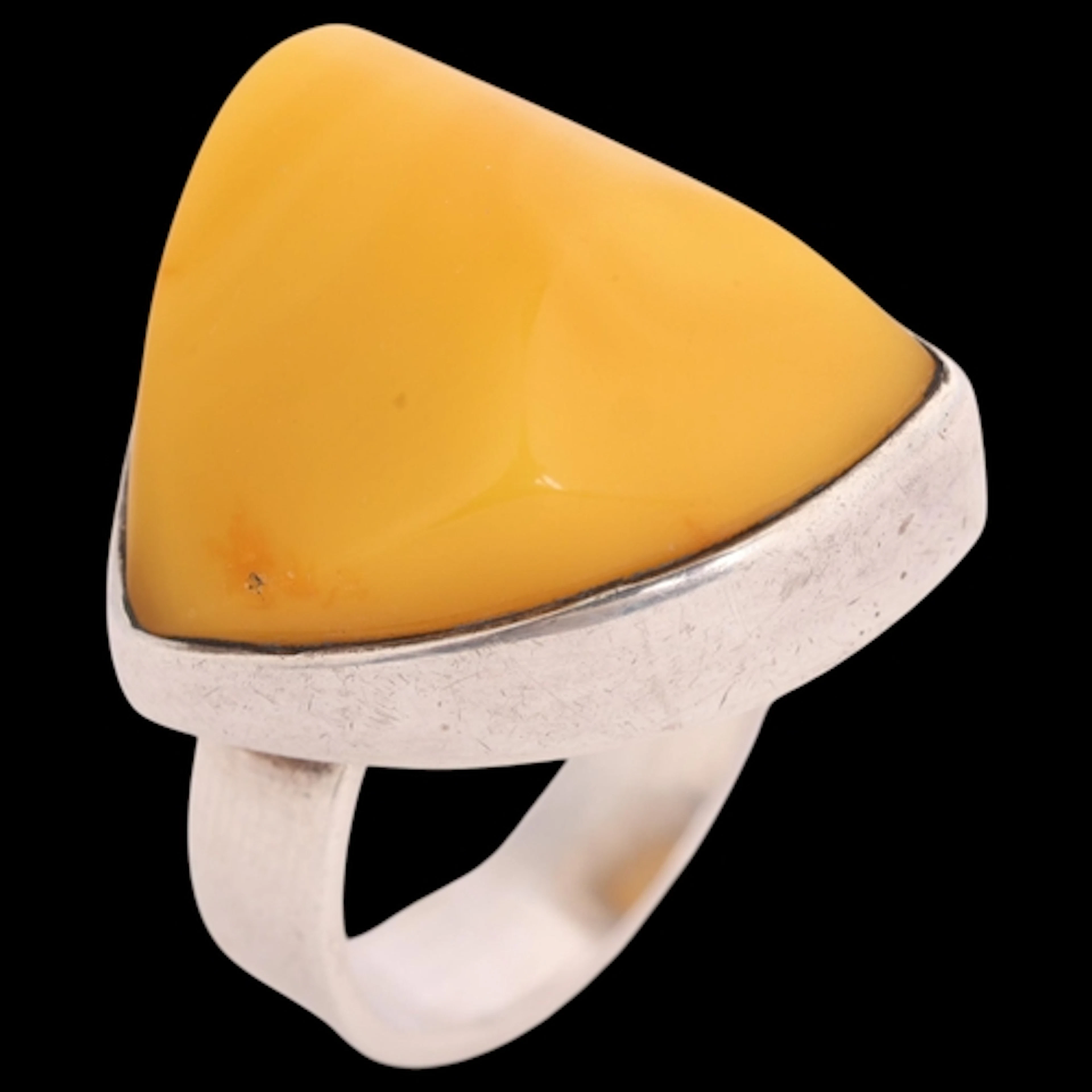 EINER FEHRN - a Danish modernist sterling silver amber ring,...