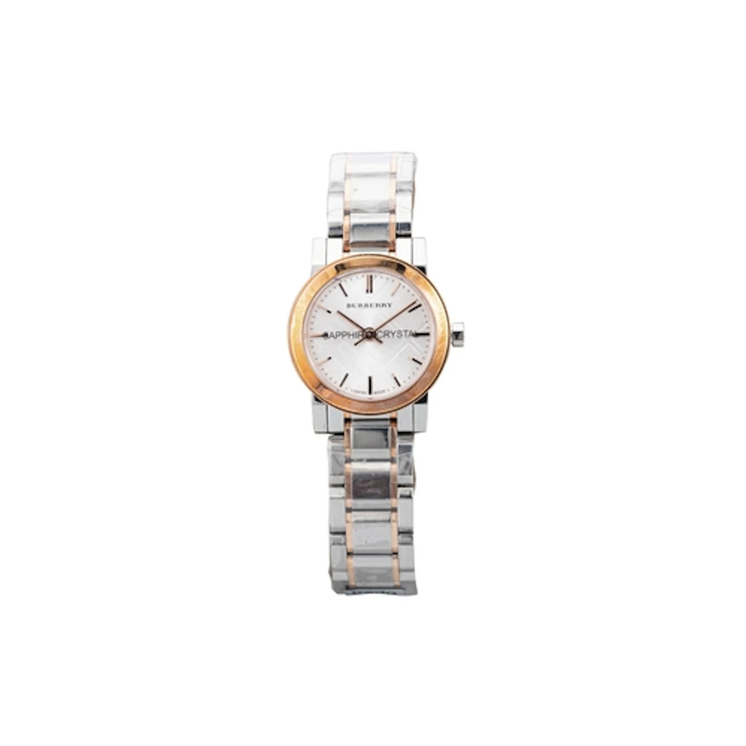 A BURBERRY TWO TONE STAINLESS STEEL WRIST WATCH, silvered fa...