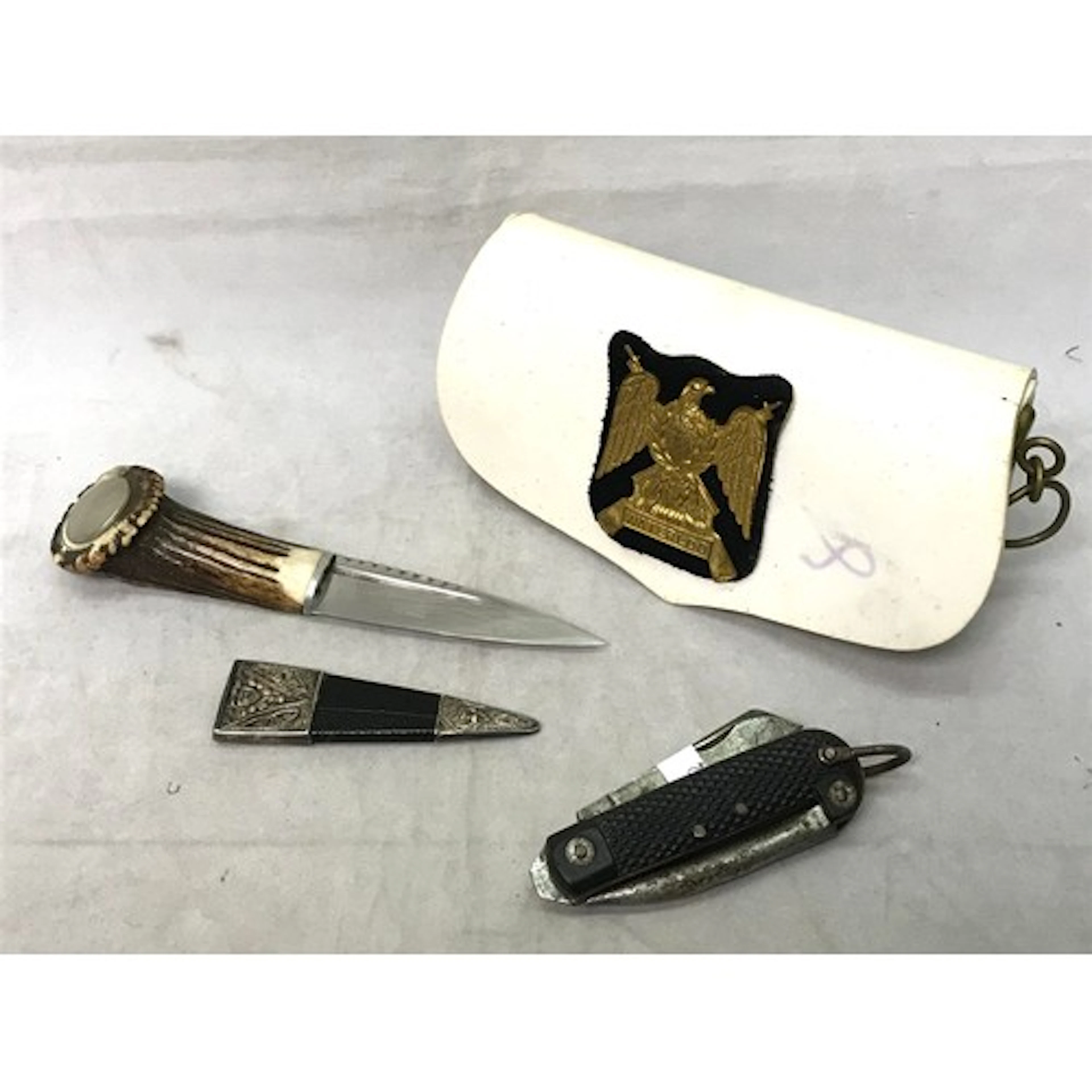 A British army jack knife, c.WW2; a "Skean-Dhu" sock knife b...