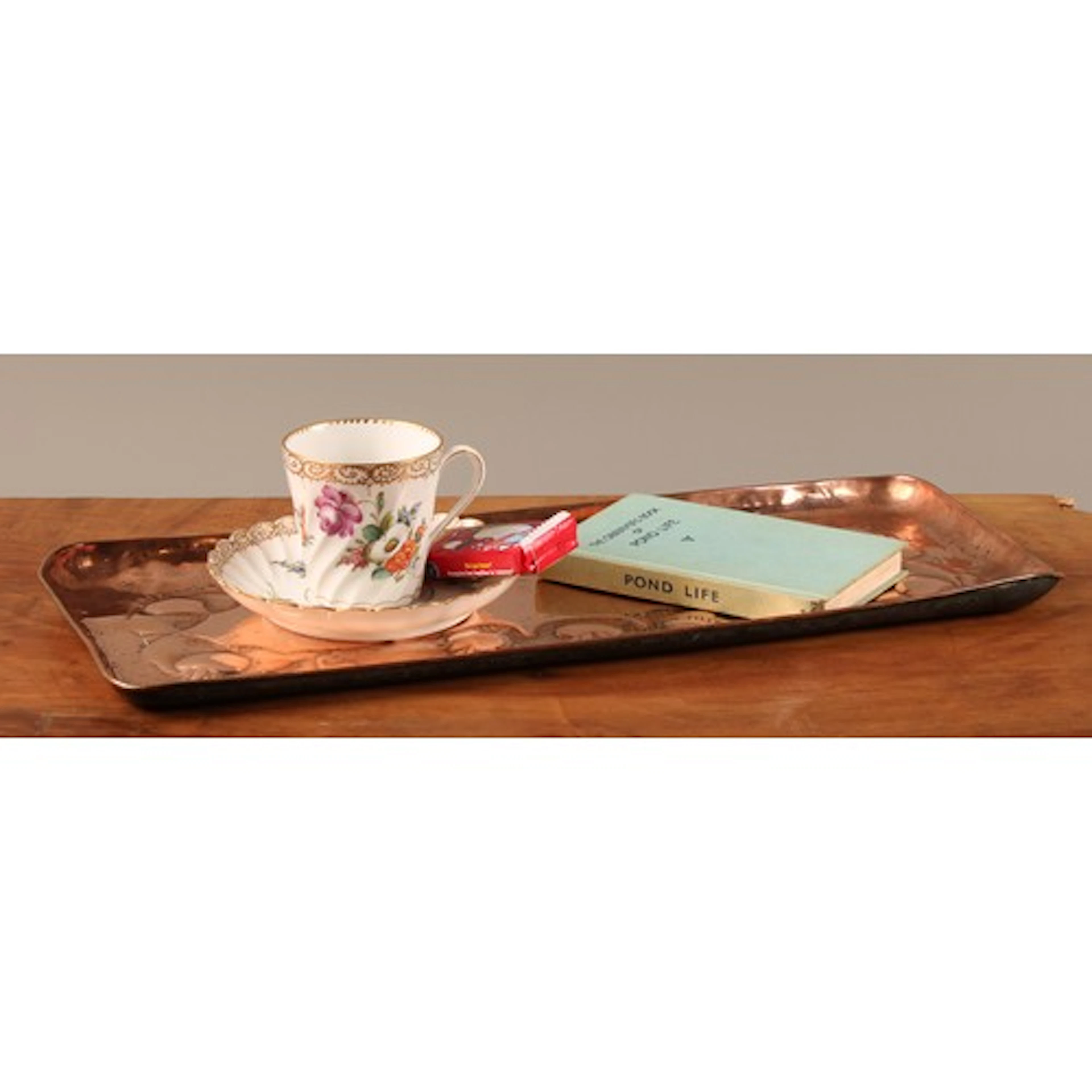 A Cornish Arts and Crafts copper rounded rectangular tray, r...