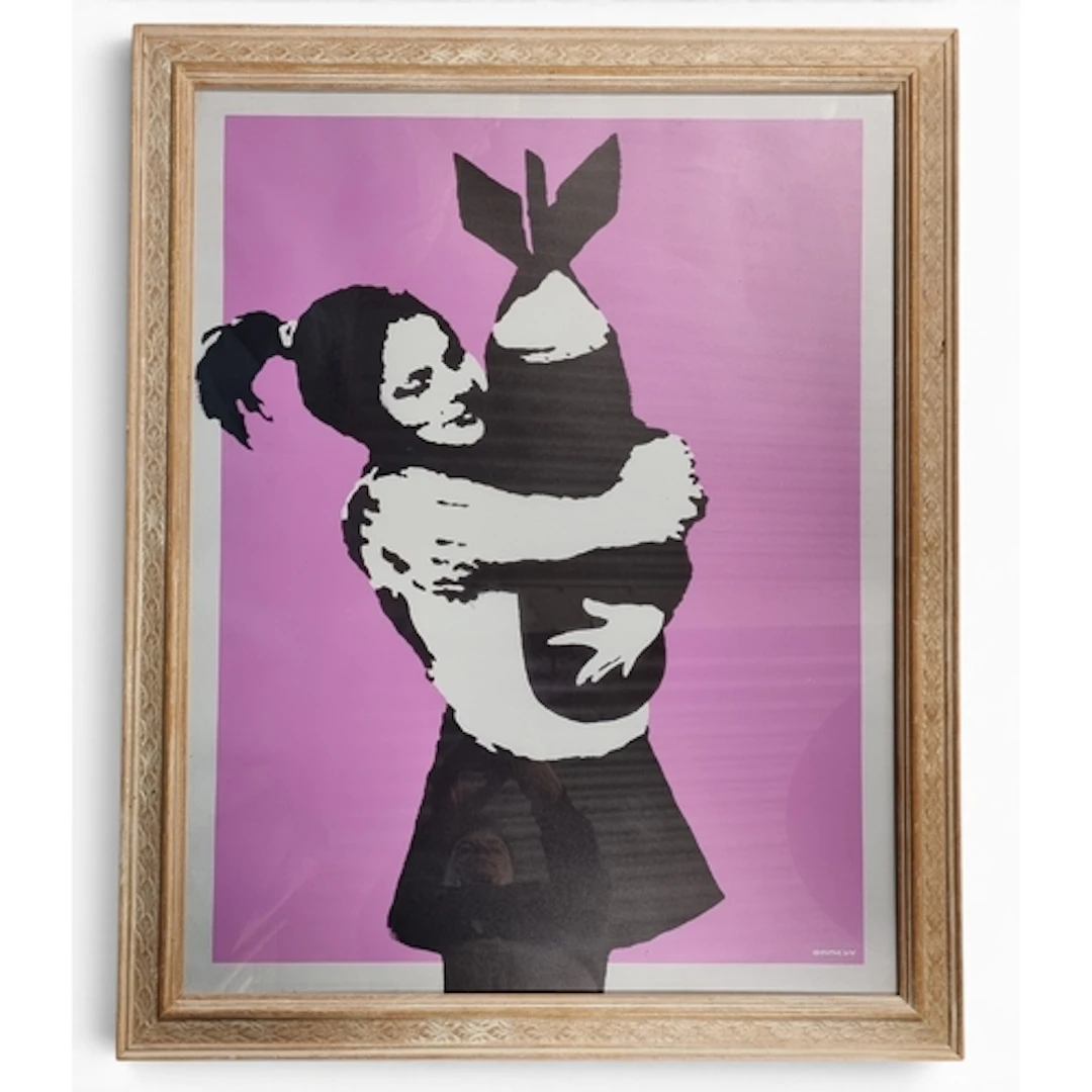 A good coloured print after Banksy "Bomb hugger". 86 x 69 cm...