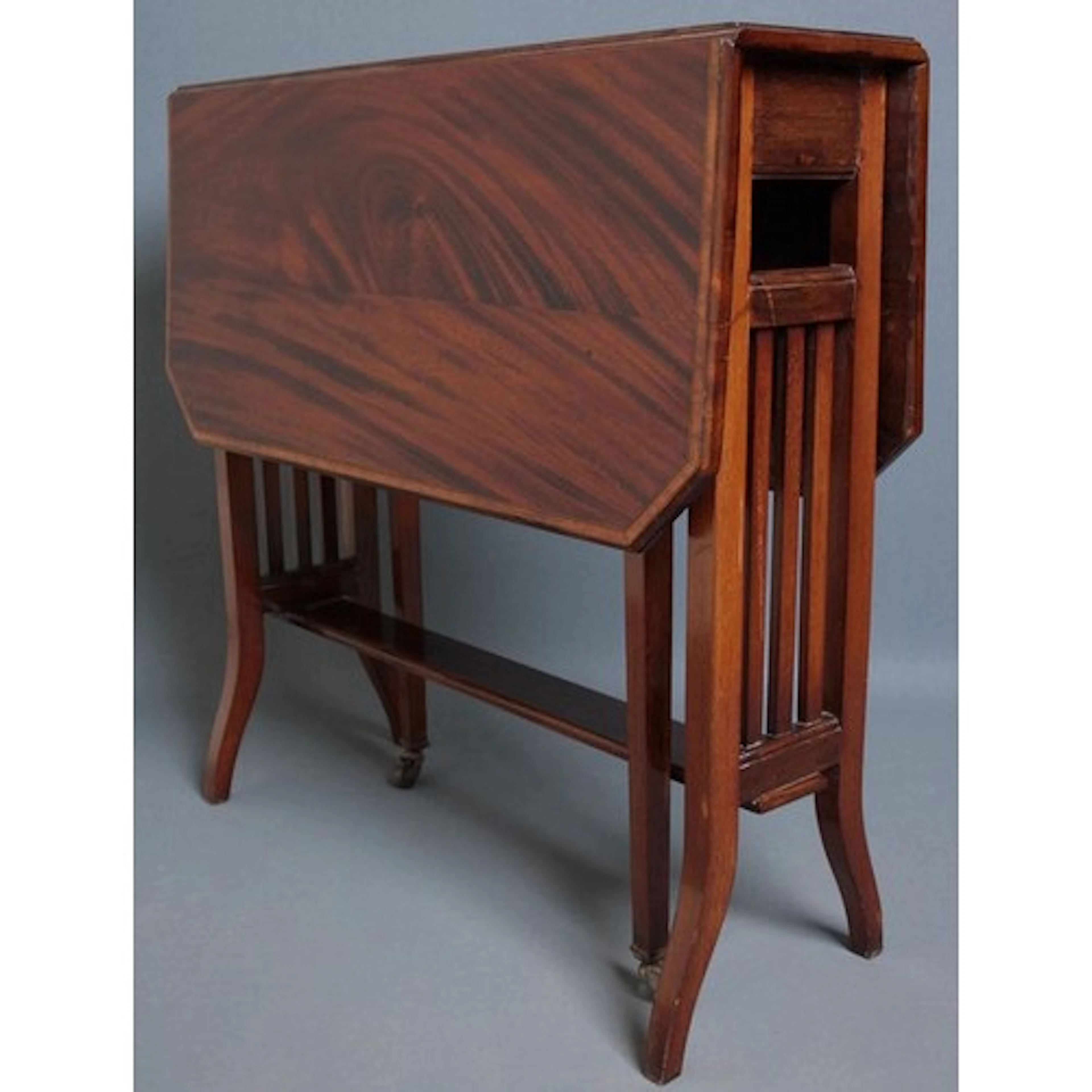Attractive and useful, Edwardian Sutherland table in mahogan...