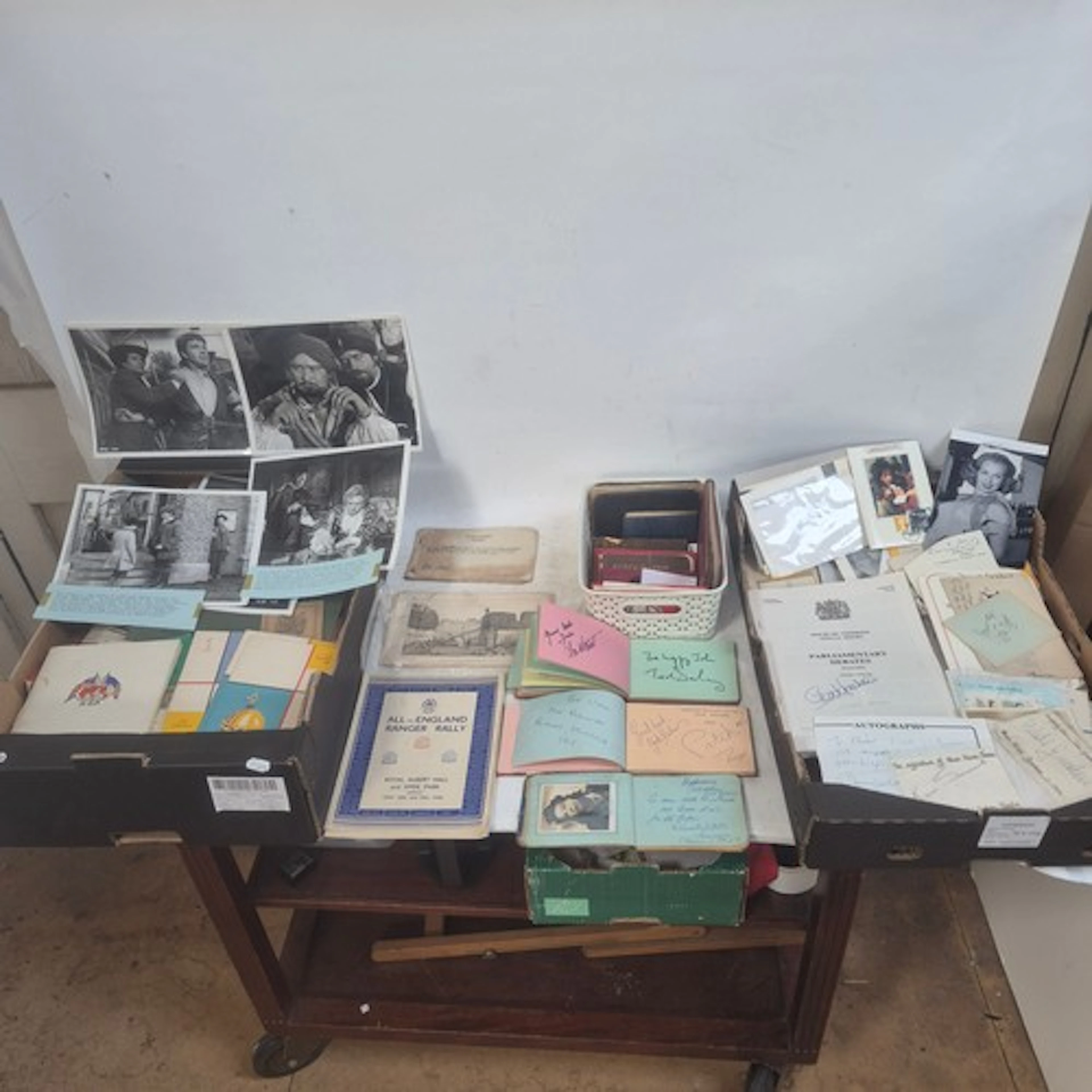A large collection of photographs, including Walt Disney fil...