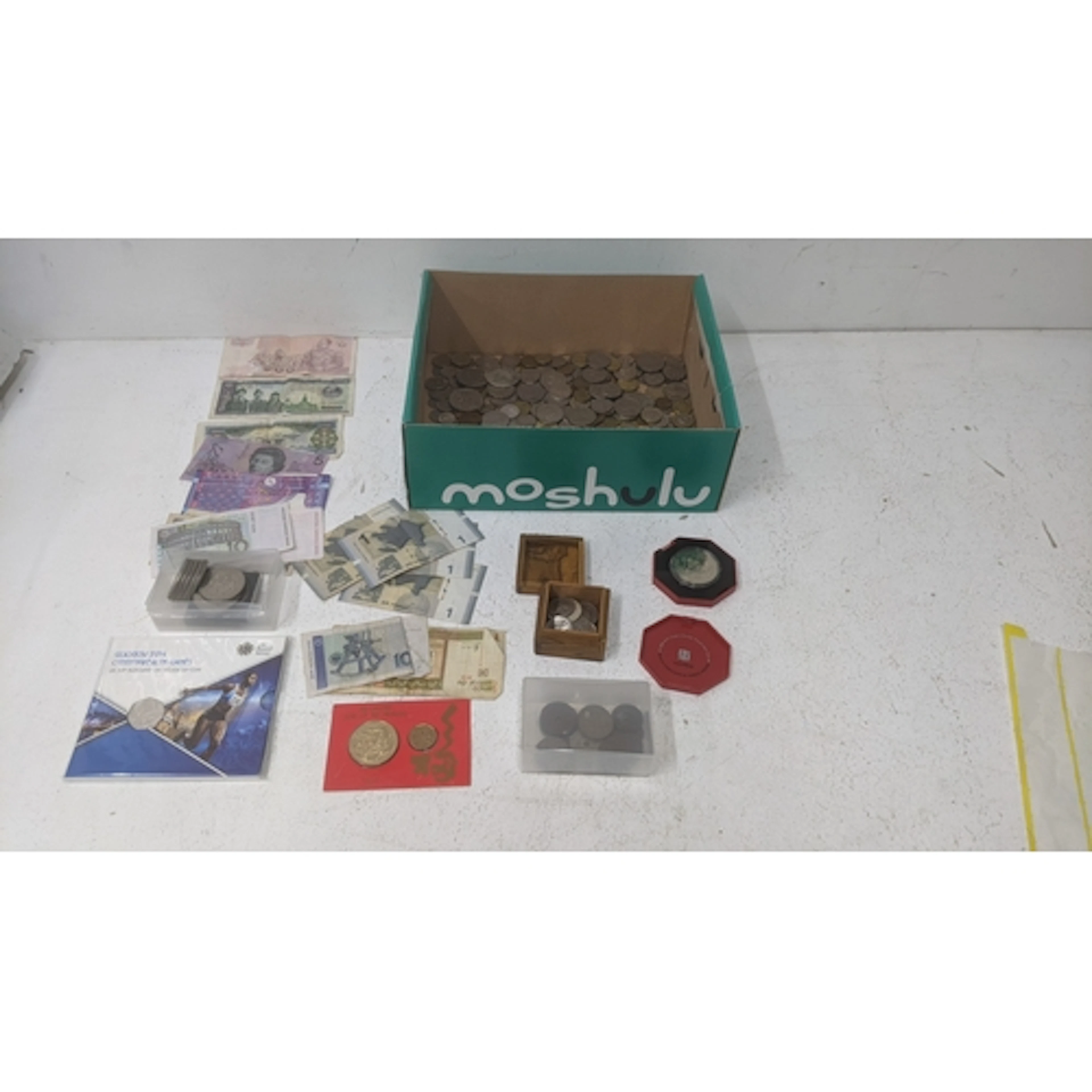 Coins to include a Singapore 1988 year of the Dragon commemo...