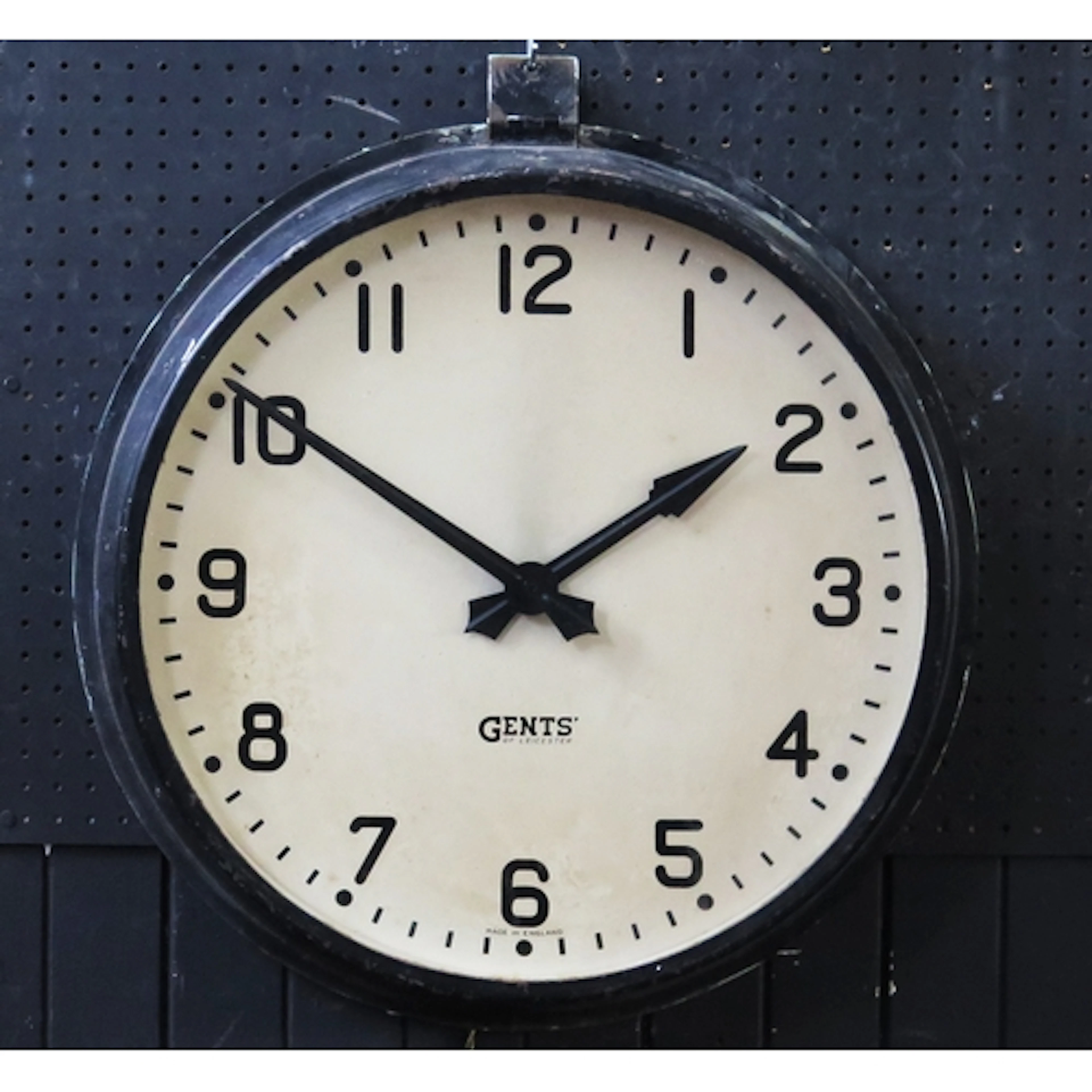 Gent's of Leicester, an electric wall mounted timepiece, wit...