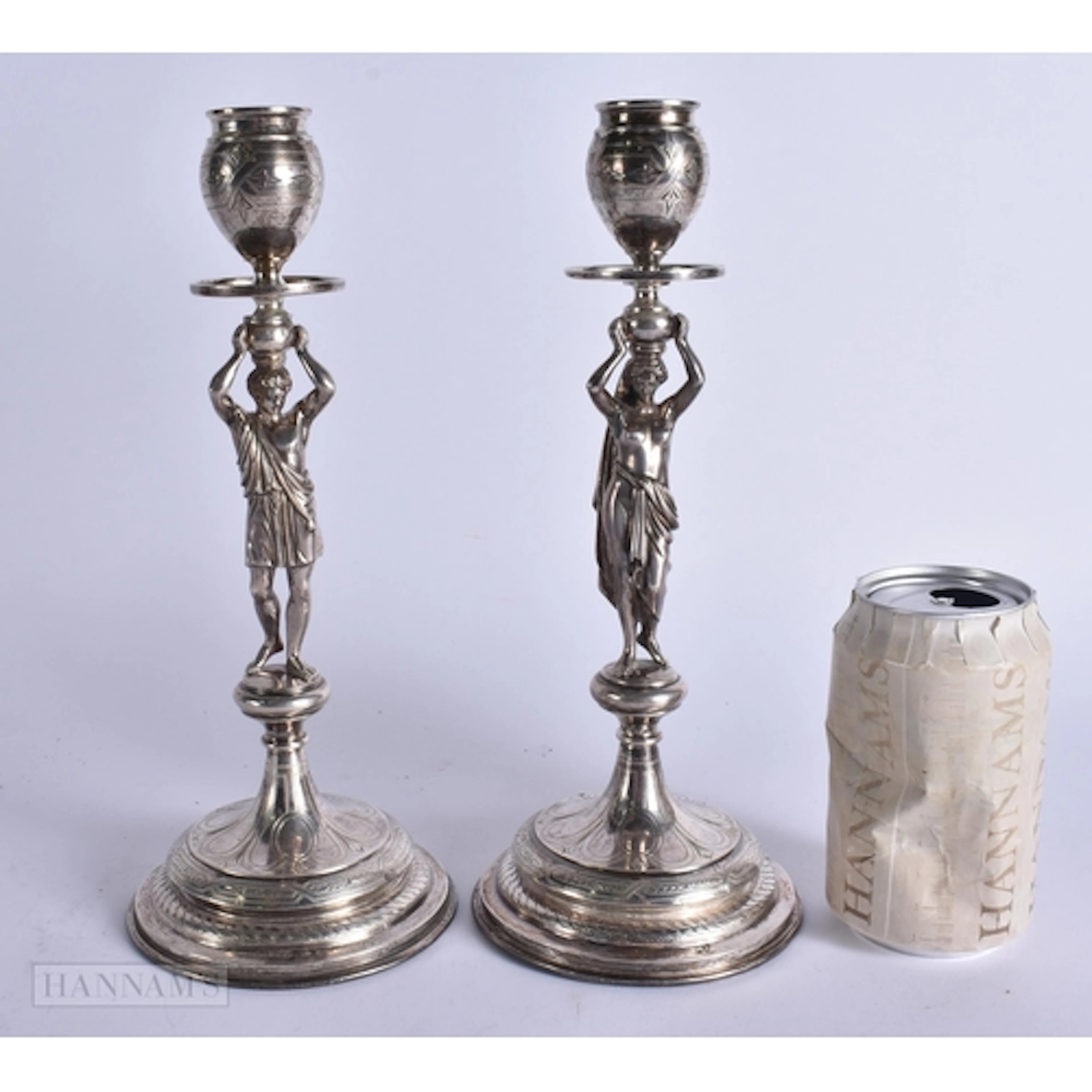 A PAIR OF ANTIQUE CONTINENTAL SILVER FIGURAL CANDLESTICKS. 1...