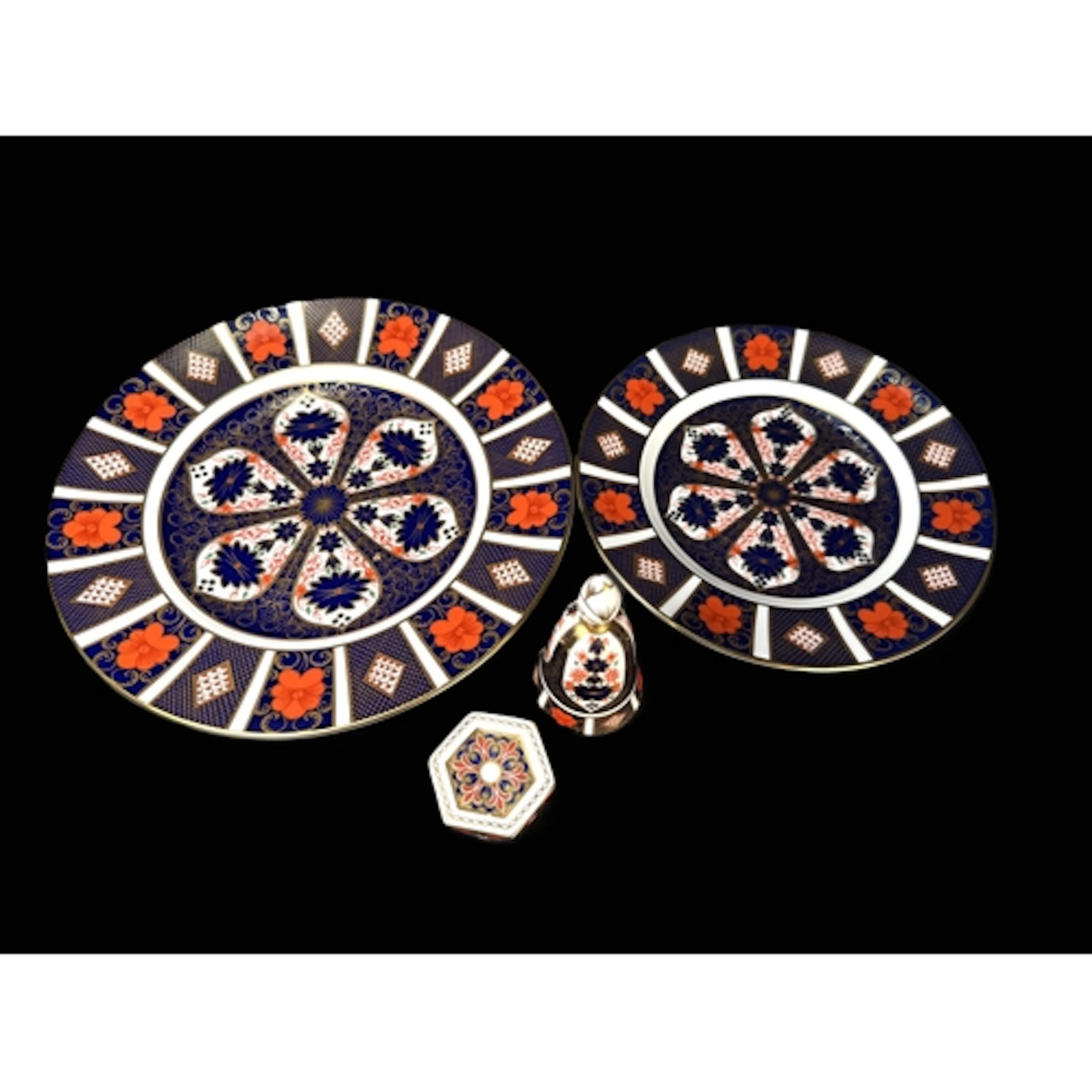 Royal Crown Derby Old Imari, two plates, a bell and a box