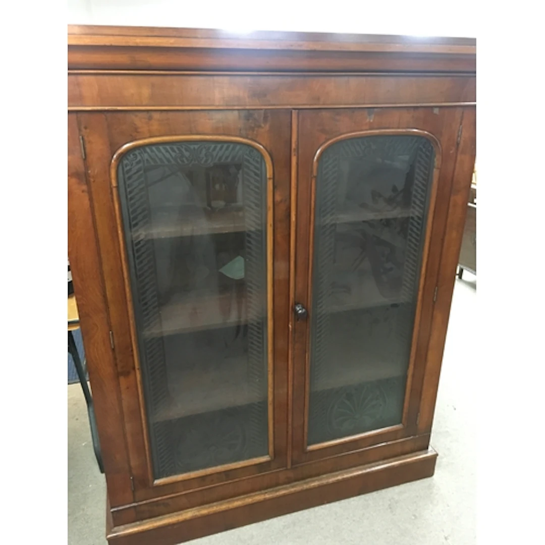 A Victorian walnut cupboard with acid etched glass 160cm tal...