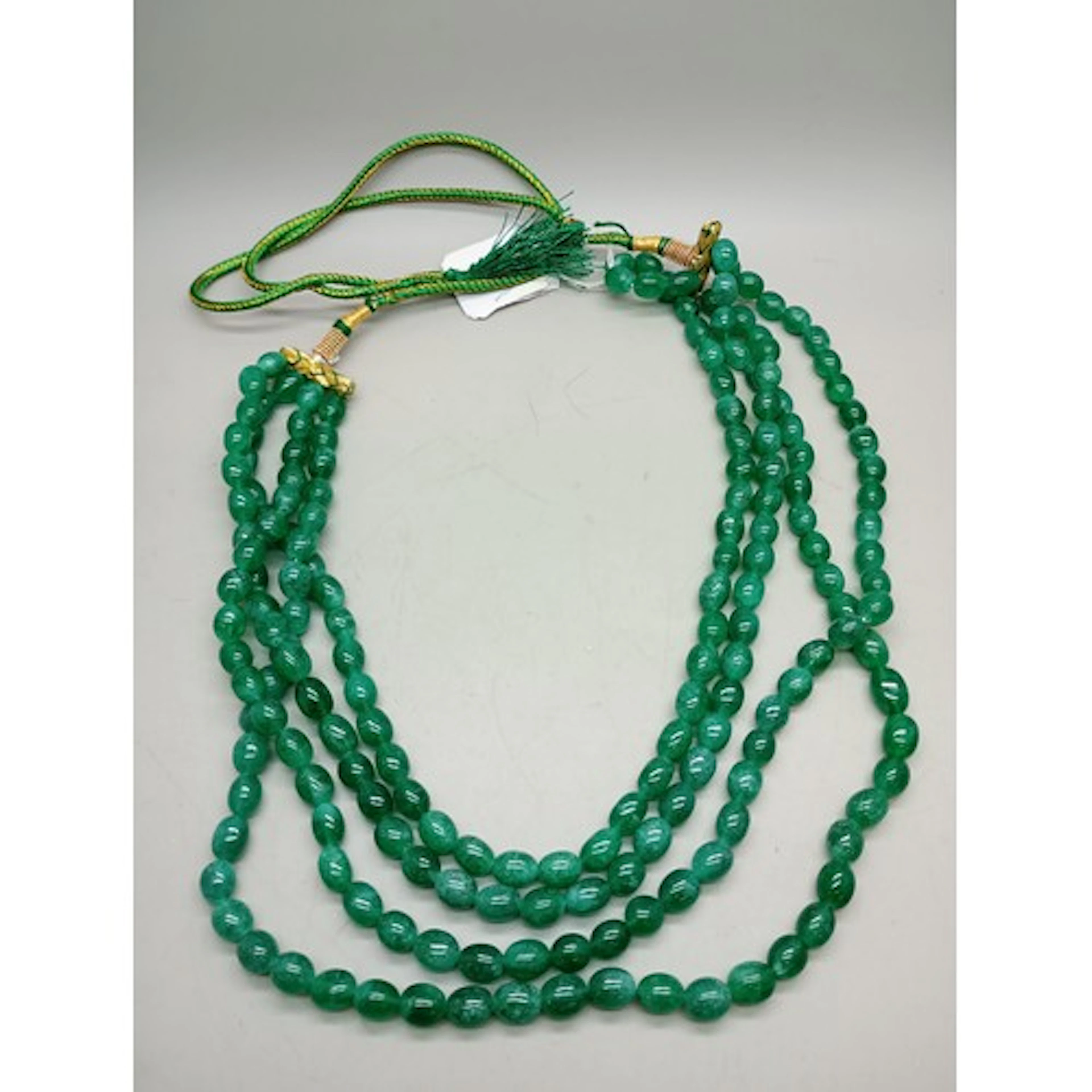 A dyed green quartz necklace, 169g
