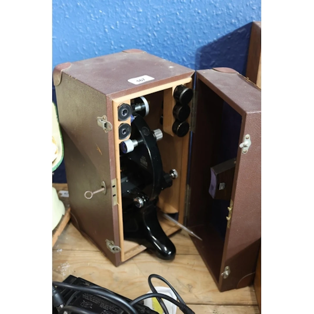 Microscope in case.