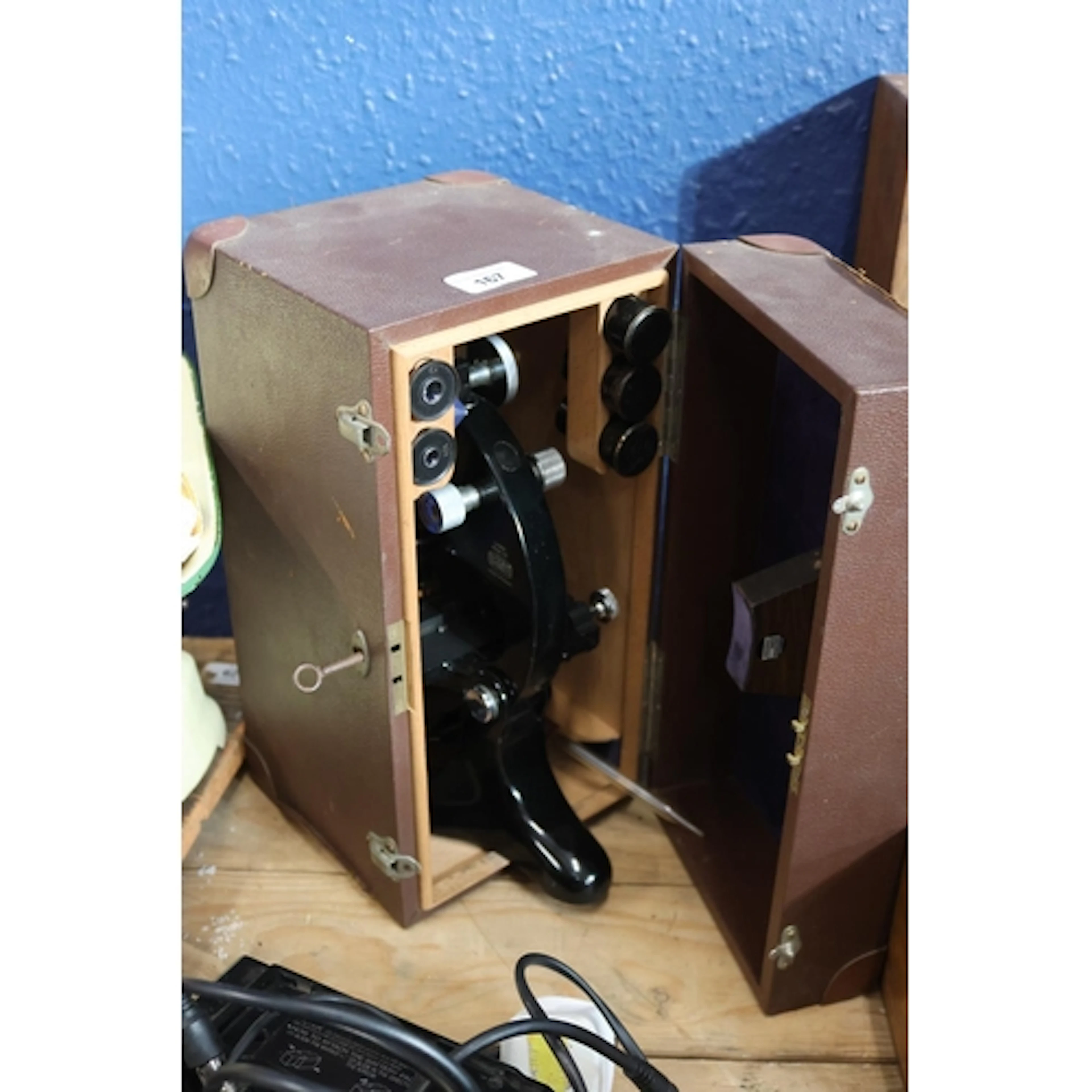 Microscope in case.