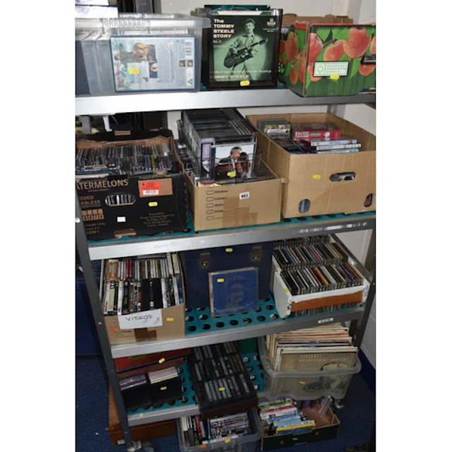BEING AUCTIONED FOR CHARITY - A LARGE QUANTITY OF CDS, DVDS,...