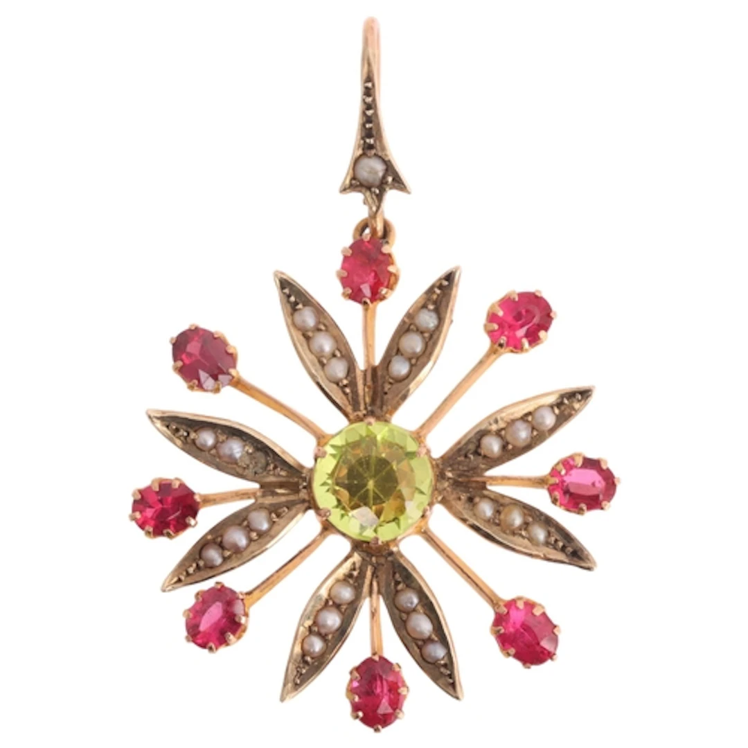 An Art Nouveau 9ct gold peridot corundum doublet and split p...