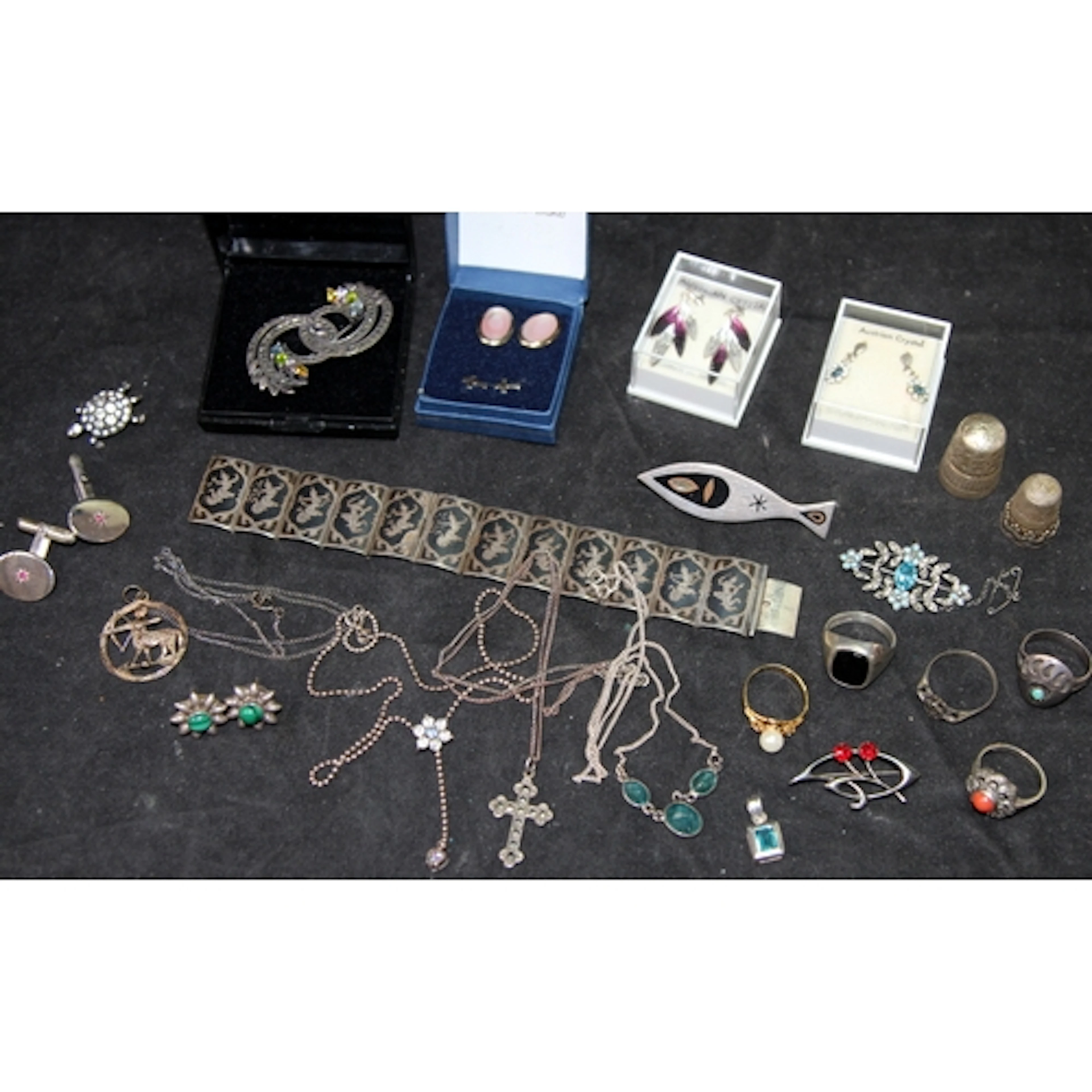 A collection of sterling silver jewellery and other silver i...