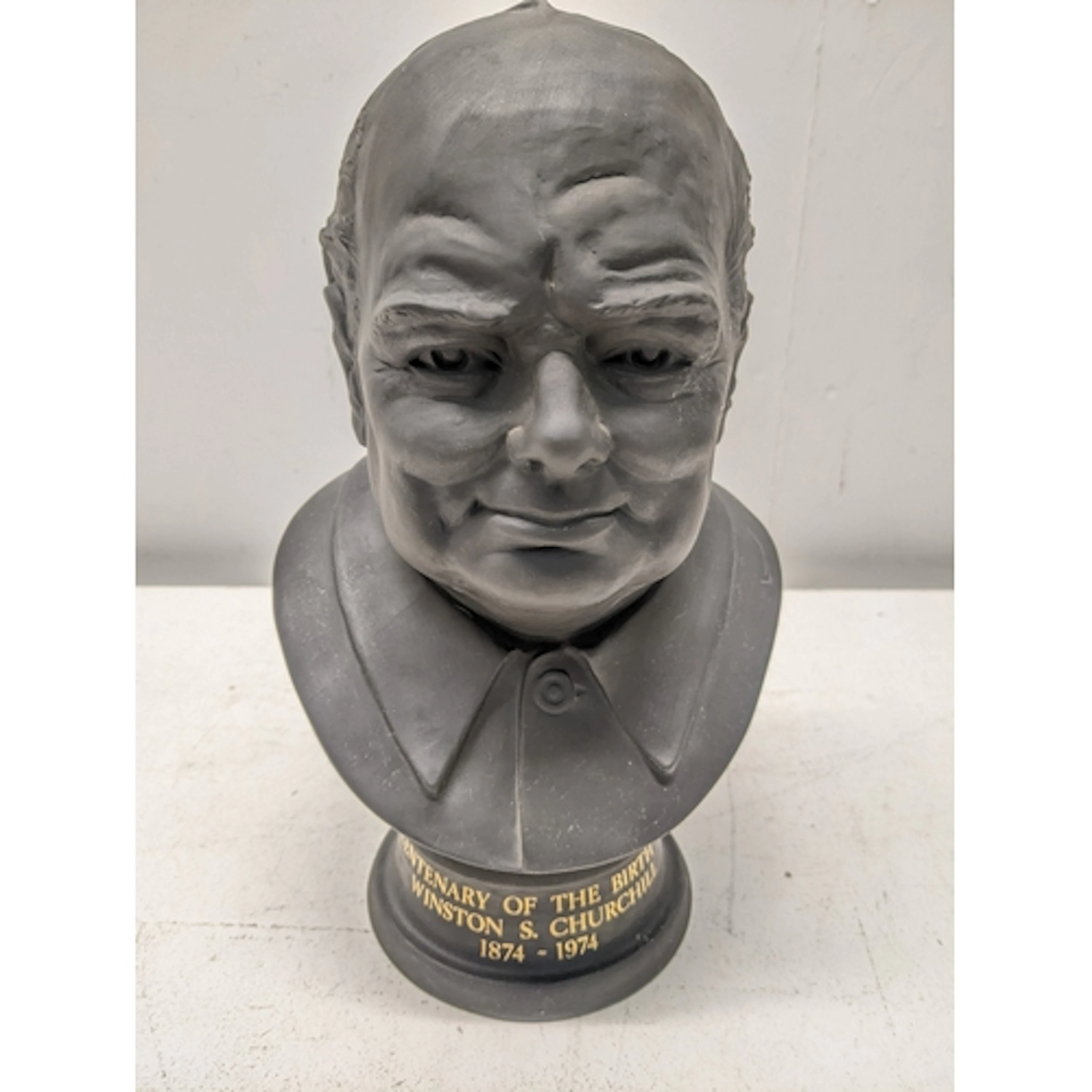 A Royal Doulton black basalt bust of Winston Churchill comme...