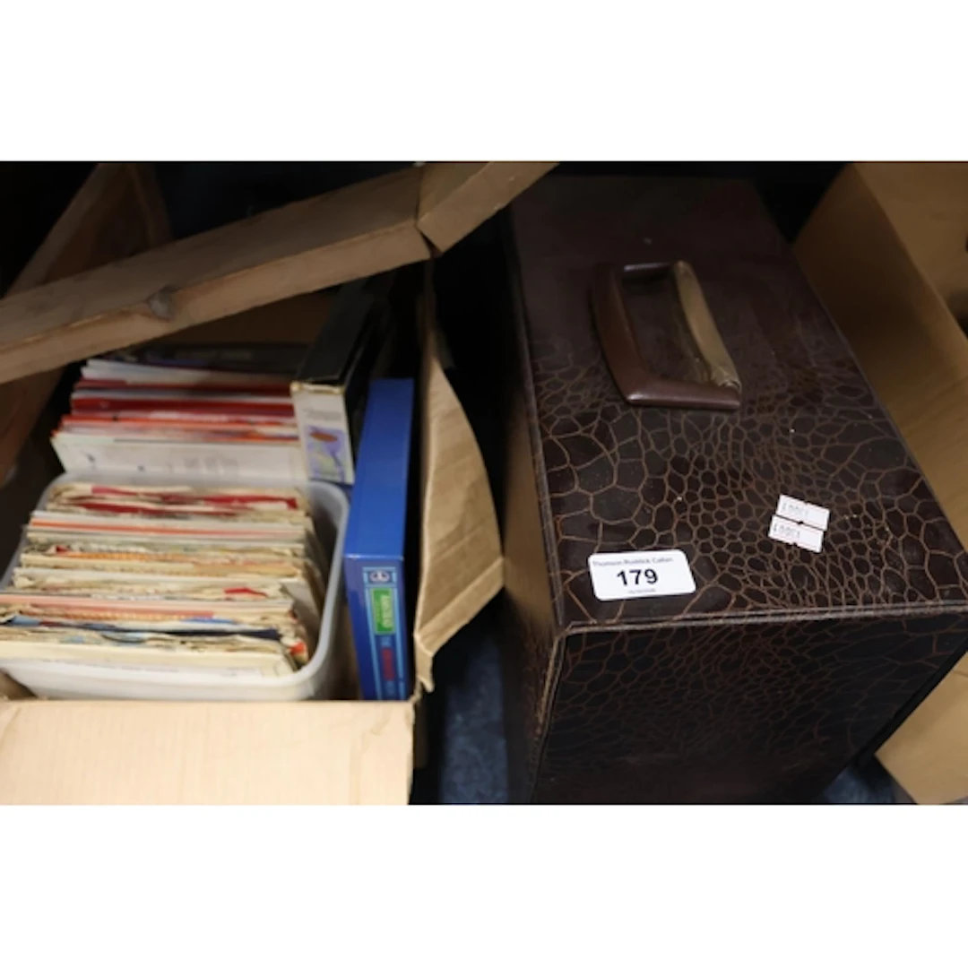 Music case containing vinyl records, singles, etc.